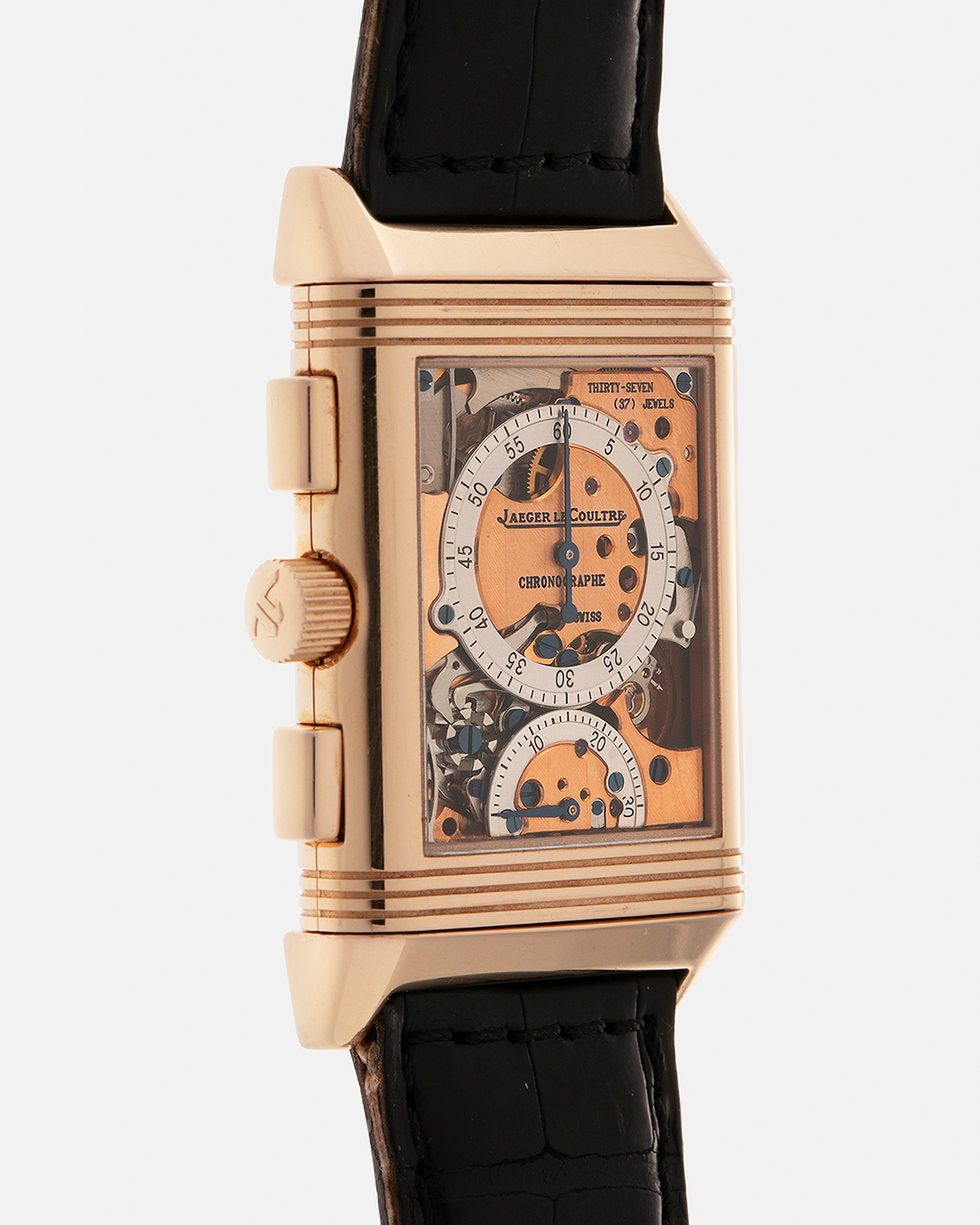 Brand: Jaeger LeCoultre
Year: 1996
Model: Reverso Chronograph Retrograde, Limited to 500 pieces
Reference: 270.2.69
Material: 18-carat Rose Gold
Movement: Jaeger LeCoultre Cal. 829, Manual-Wind
Case Dimensions: 42mm (Including Lugs) x 26mm x 9.5mm
Lug Width: 19mm
Strap: Jaeger-LeCoultre Black Alligator Leather Strap with Signed 18-carat Rose Gold Deployant Clasp