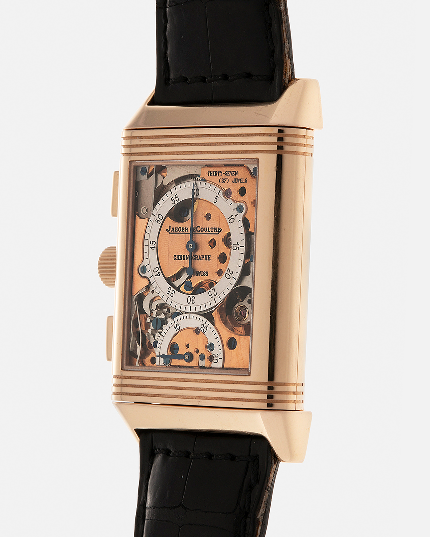 Brand: Jaeger LeCoultre
Year: 1996
Model: Reverso Chronograph Retrograde, Limited to 500 pieces
Reference: 270.2.69
Material: 18-carat Rose Gold
Movement: Jaeger LeCoultre Cal. 829, Manual-Wind
Case Dimensions: 42mm (Including Lugs) x 26mm x 9.5mm
Lug Width: 19mm
Strap: Jaeger-LeCoultre Black Alligator Leather Strap with Signed 18-carat Rose Gold Deployant Clasp