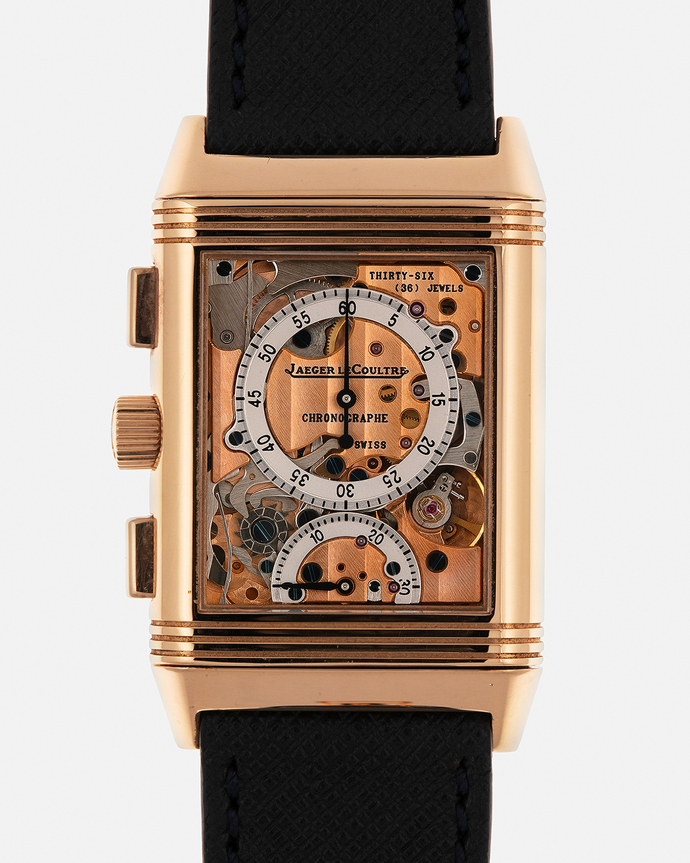 Brand: Jaeger LeCoultre
Year: 1996
Model: Reverso Chronograph Retrograde, Limited to 500 pieces
Reference: 270.2.69
Material: 18-carat Rose Gold
Movement: Jaeger LeCoultre Cal. 829, Manual-Wind
Case Dimensions: 42mm (Including Lugs) x 26mm x 9.5mm
Lug Width: 19mm
Strap: Molequin Navy Blue Textured Calf with Signed 18-carat Rose Gold Deployant Clasp
