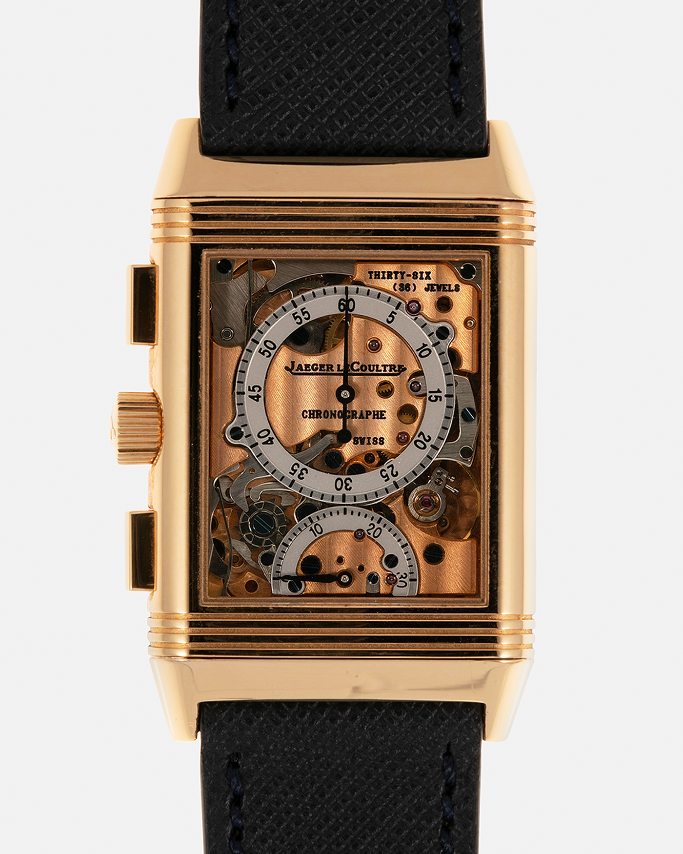 Brand: Jaeger LeCoultre Year: 1996 Model: Reverso Chronographe Retrograde, Limited to 500 pieces Reference: 270.2.69 Material: 18-carat Rose Gold Movement: Jaeger LeCoultre Cal. 829, Manual-Wind Case Dimensions: 42mm x 26mm x 9.5mm Lug Width: 19mm Strap: Molequin Navy Blue Textured Calf with Signed 18-carat Rose Gold Deployant Clasp