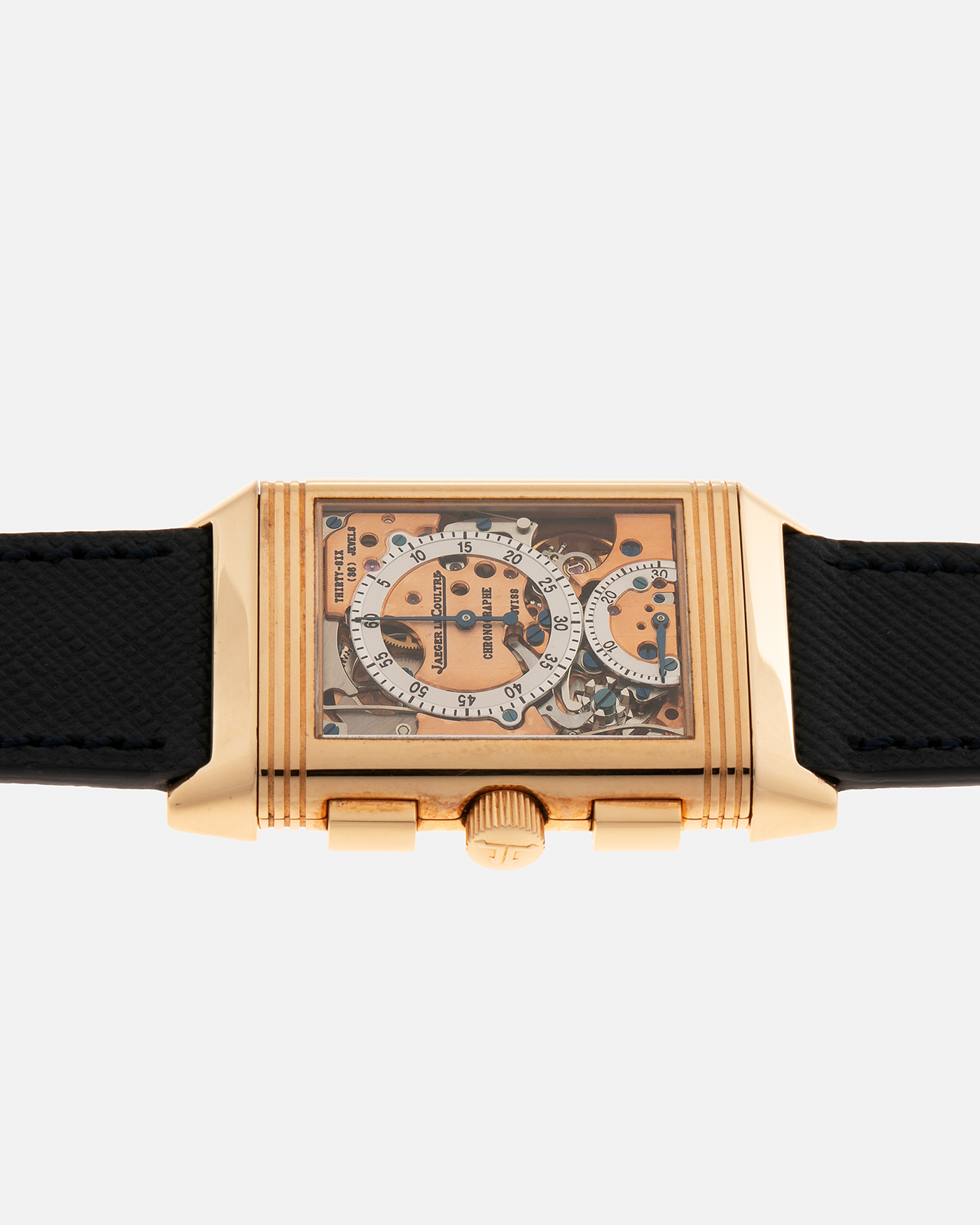 Brand: Jaeger LeCoultre Year: 1996 Model: Reverso Chronographe Retrograde, Limited to 500 pieces Reference: 270.2.69 Material: 18-carat Rose Gold Movement: Jaeger LeCoultre Cal. 829, Manual-Wind Case Dimensions: 42mm x 26mm x 9.5mm Lug Width: 19mm Strap: Molequin Navy Blue Textured Calf with Signed 18-carat Rose Gold Deployant Clasp