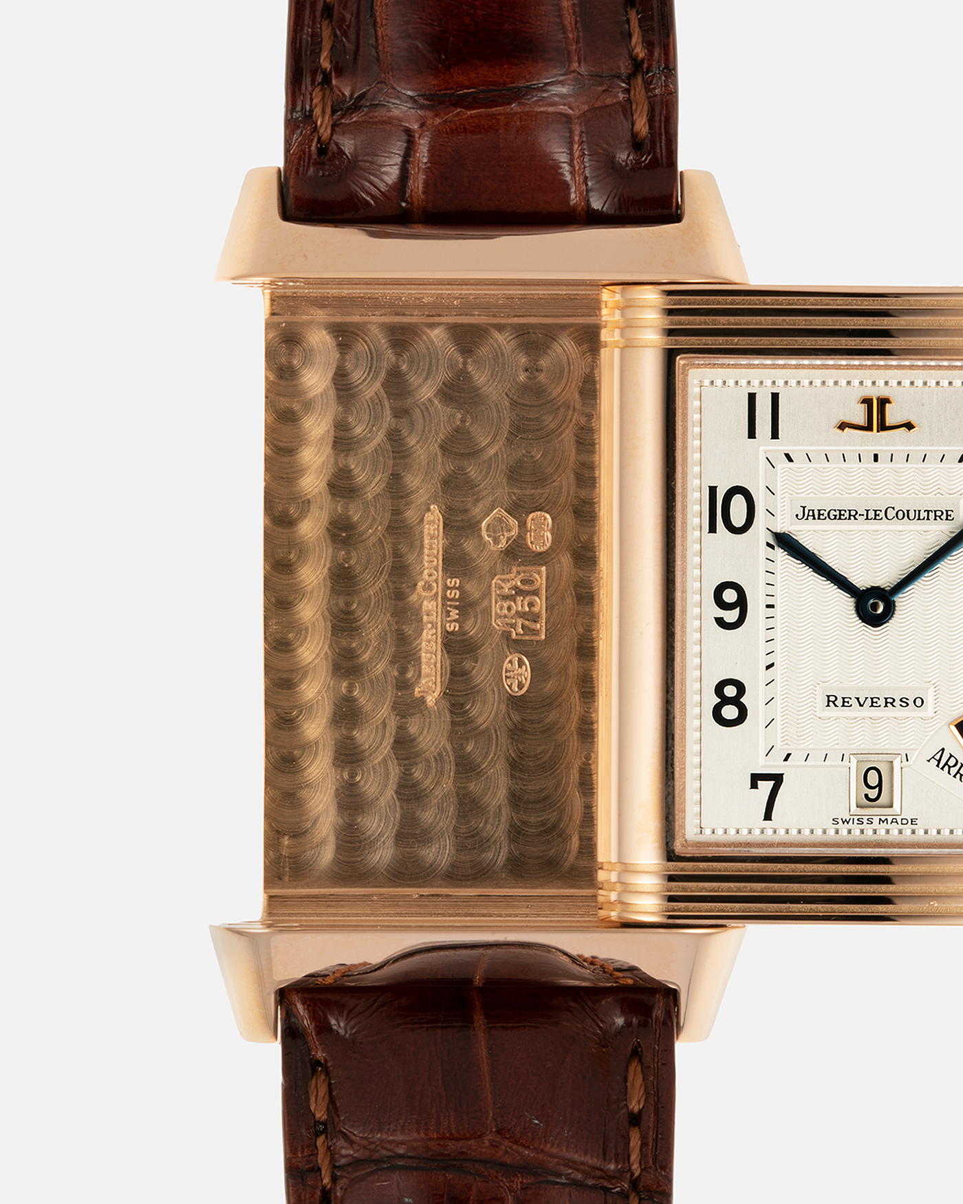 Brand: Jaeger LeCoultre
Year: 1996
Model: Reverso Chronographe Retrograde, Limited to 500 pieces
Reference: 270.2.69
Material: 18-carat Rose Gold
Movement: Jaeger LeCoultre Cal. 829, Manual-Winding
Case Dimensions: 42mm (including lugs) x 26mm x 9.5mm
Lug Width: 19mm
Strap: Jean Rosseau Brown Alligator Leather Strap with Signed 18-carat Rose Gold Deployant Clasp