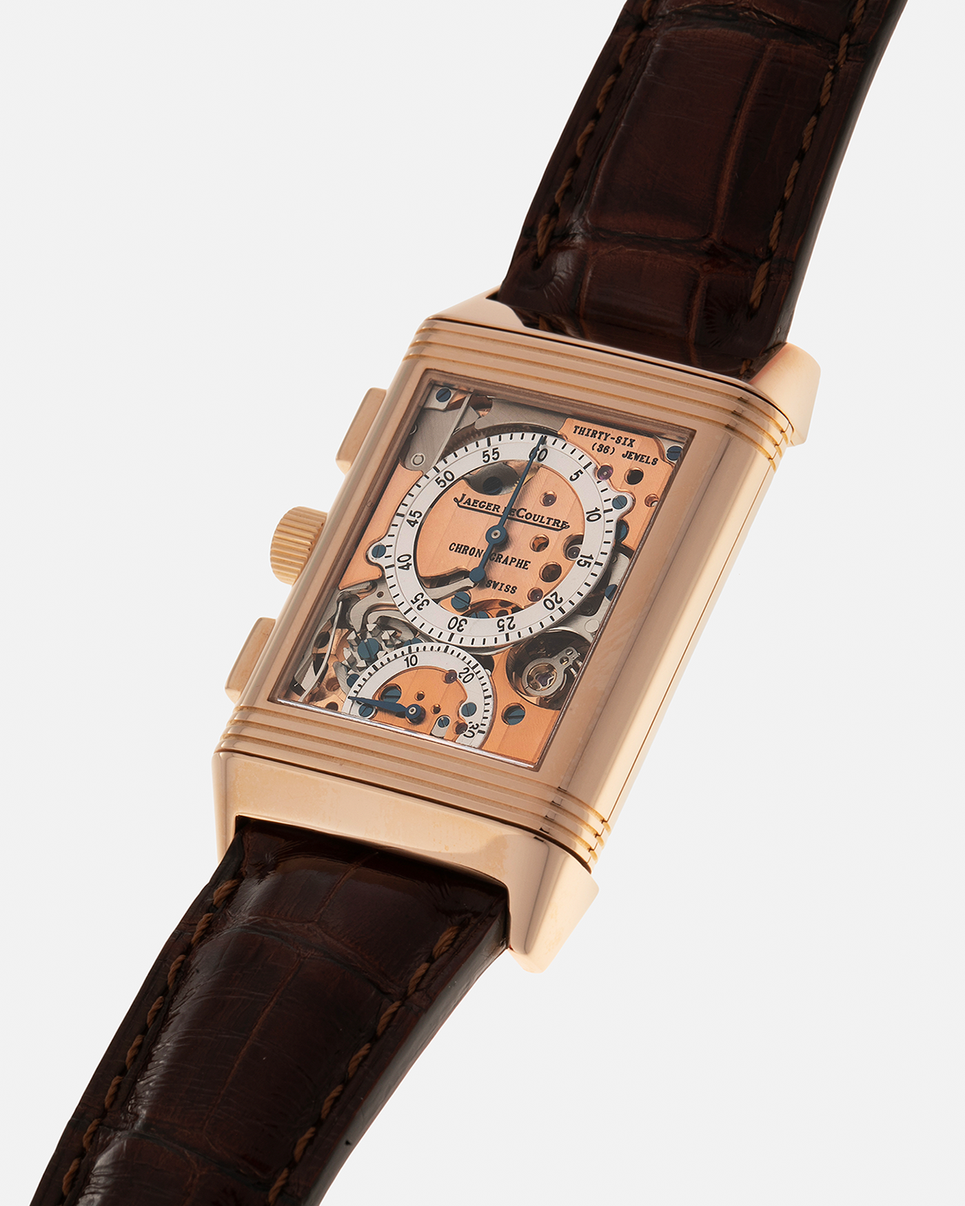 Brand: Jaeger LeCoultre
Year: 1996
Model: Reverso Chronographe Retrograde, Limited to 500 pieces
Reference: 270.2.69
Material: 18-carat Rose Gold
Movement: Jaeger LeCoultre Cal. 829, Manual-Winding
Case Dimensions: 42mm (including lugs) x 26mm x 9.5mm
Lug Width: 19mm
Strap: Jean Rosseau Brown Alligator Leather Strap with Signed 18-carat Rose Gold Deployant Clasp