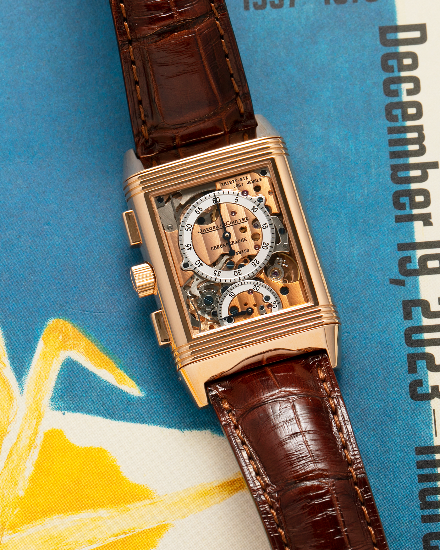 Brand: Jaeger LeCoultre
Year: 1996
Model: Reverso Chronographe Retrograde, Limited to 500 pieces
Reference: 270.2.69
Material: 18-carat Rose Gold
Movement: Jaeger LeCoultre Cal. 829, Manual-Winding
Case Dimensions: 42mm (including lugs) x 26mm x 9.5mm
Lug Width: 19mm
Strap: Jean Rosseau Brown Alligator Leather Strap with Signed 18-carat Rose Gold Deployant Clasp