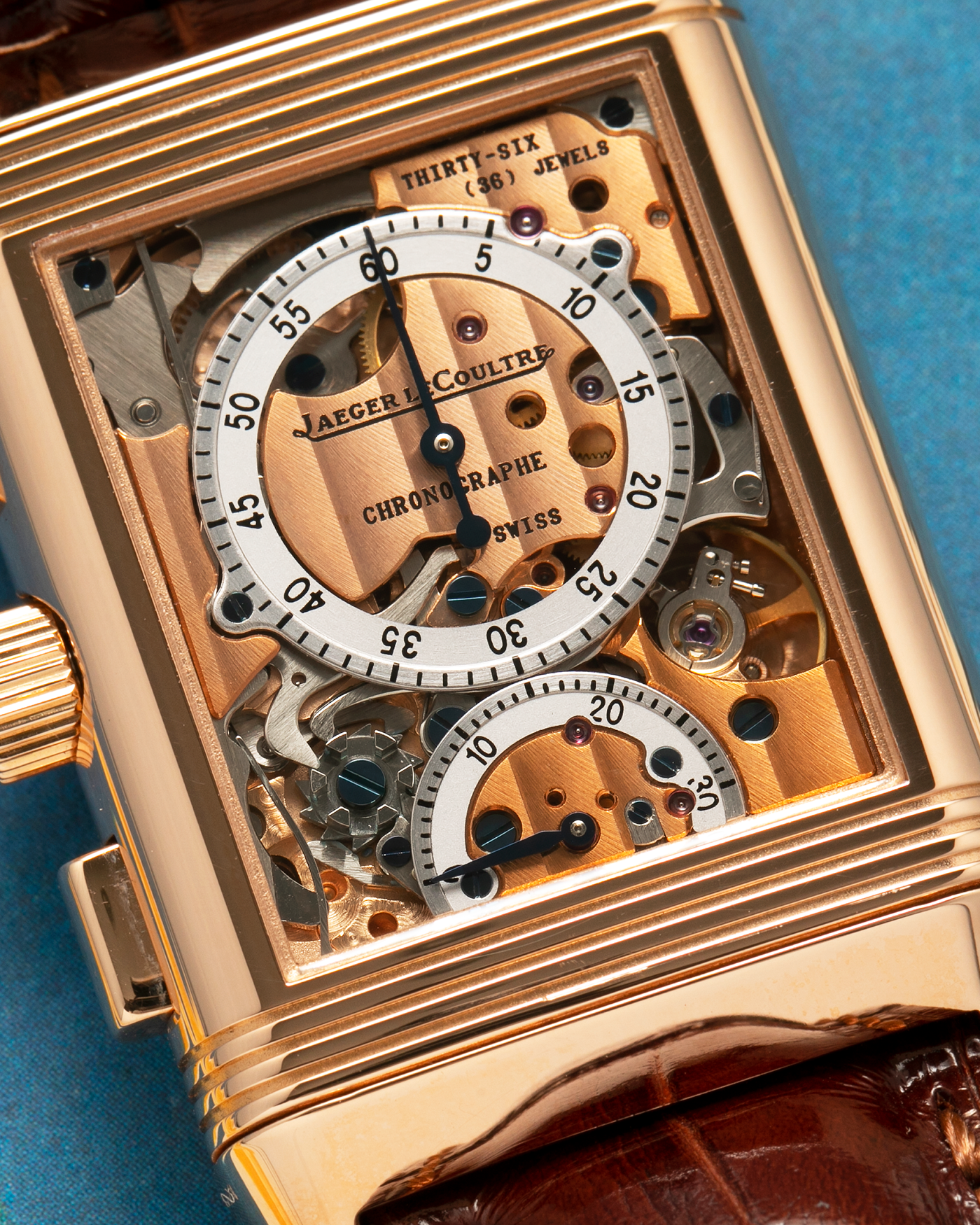 Brand: Jaeger LeCoultre
Year: 1996
Model: Reverso Chronographe Retrograde, Limited to 500 pieces
Reference: 270.2.69
Material: 18-carat Rose Gold
Movement: Jaeger LeCoultre Cal. 829, Manual-Winding
Case Dimensions: 42mm (including lugs) x 26mm x 9.5mm
Lug Width: 19mm
Strap: Jean Rosseau Brown Alligator Leather Strap with Signed 18-carat Rose Gold Deployant Clasp