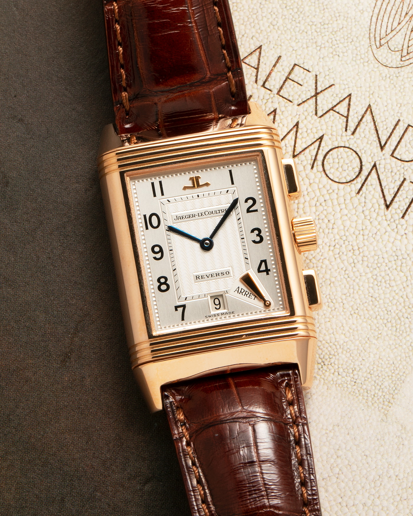 Brand: Jaeger LeCoultre
Year: 1996
Model: Reverso Chronographe Retrograde, Limited to 500 pieces
Reference: 270.2.69
Material: 18-carat Rose Gold
Movement: Jaeger LeCoultre Cal. 829, Manual-Winding
Case Dimensions: 42mm (including lugs) x 26mm x 9.5mm
Lug Width: 19mm
Strap: Jean Rosseau Brown Alligator Leather Strap with Signed 18-carat Rose Gold Deployant Clasp