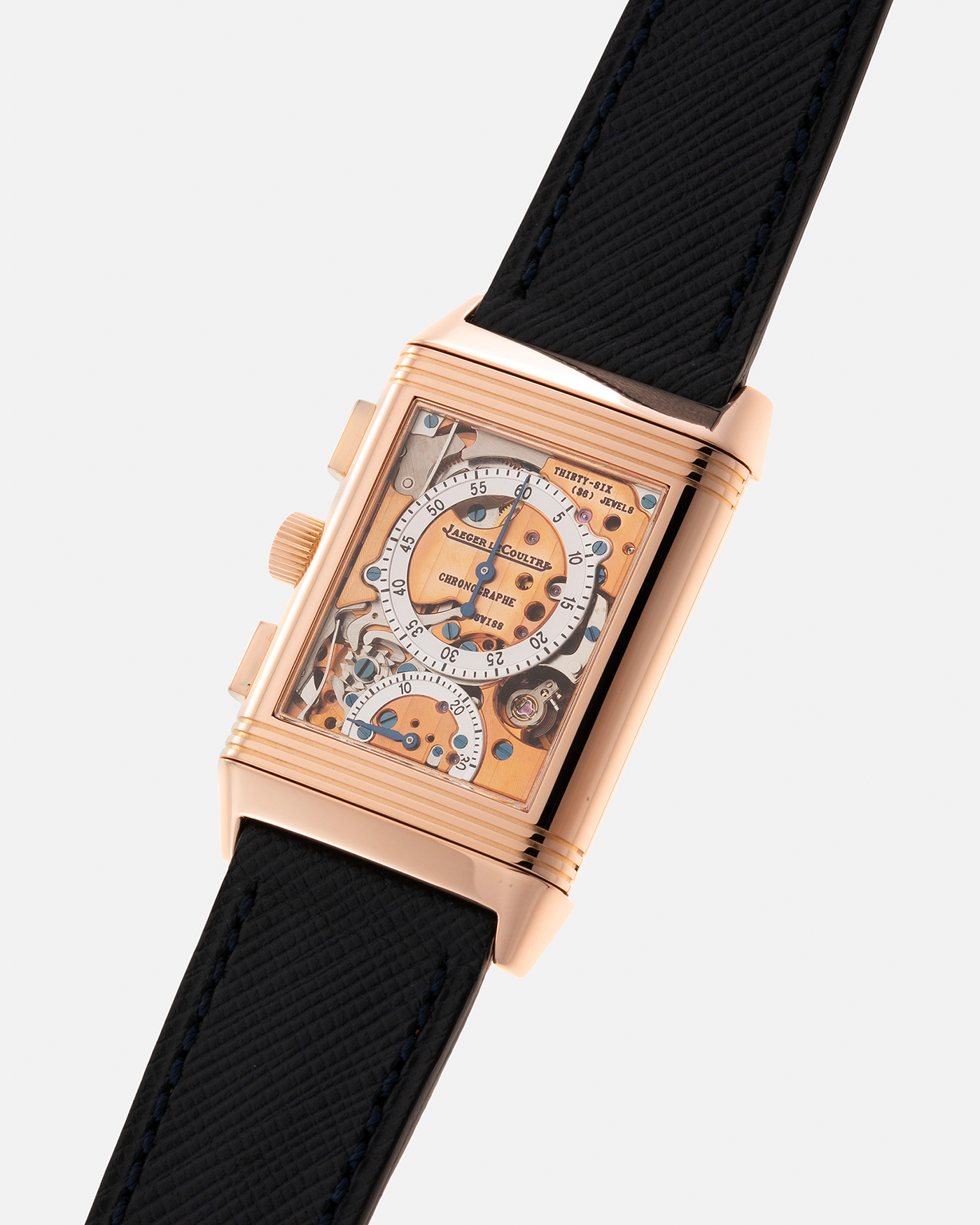 Brand: Jaeger LeCoultre Year: 1996 Model: Reverso Chronographe Retrograde, Limited to 500 pieces Reference: 270.2.69 Material: 18-carat Rose Gold Movement: JLC Cal. 829, Manual-Wind Case Diameter: 42mm x 26mm x 9.5mm Strap: Molequin Navy Blue Textured Calf with Signed 18-carat Rose Gold Deployant Clasp