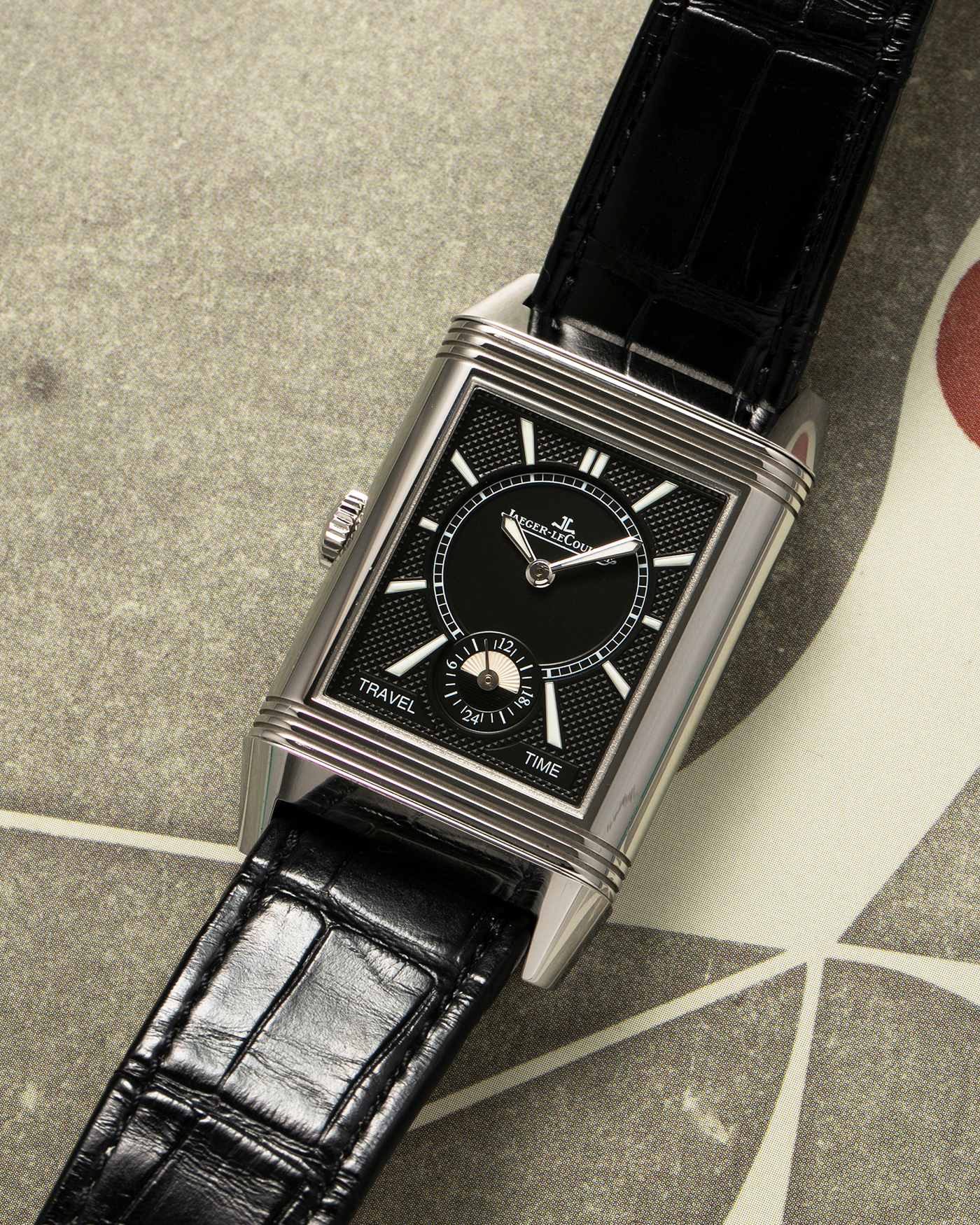 Brand: Jaeger LeCoultre Year: 2020 Model: Reverso Classic Large Duoface Q3848422 Reference Number: 215.8.D4 Material: Stainless Steel Movement: Jaeger LeCoultre Cal. 854A/2, Manual-Wind Case Dimensions: 47mm x 28.3mm x 10.3mm Lug Width: 20mm Strap: Jaeger LeCoultre Case Black Alligator Leather Strap with Signed Stainless Steel Deployant Buckle