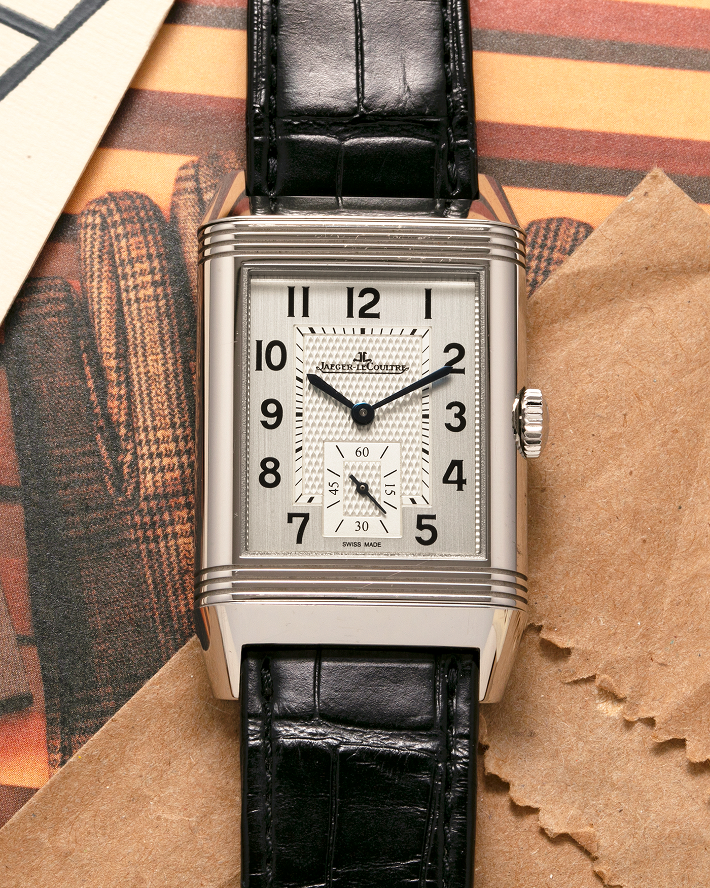 Brand: Jaeger LeCoultre Year: 2020 Model: Reverso Classic Large Duoface Q3848422 Reference Number: 215.8.D4 Material: Stainless Steel Movement: Jaeger LeCoultre Cal. 854A/2, Manual-Wind Case Dimensions: 47mm x 28.3mm x 10.3mm Lug Width: 20mm Strap: Jaeger LeCoultre Case Black Alligator Leather Strap with Signed Stainless Steel Deployant Buckle
