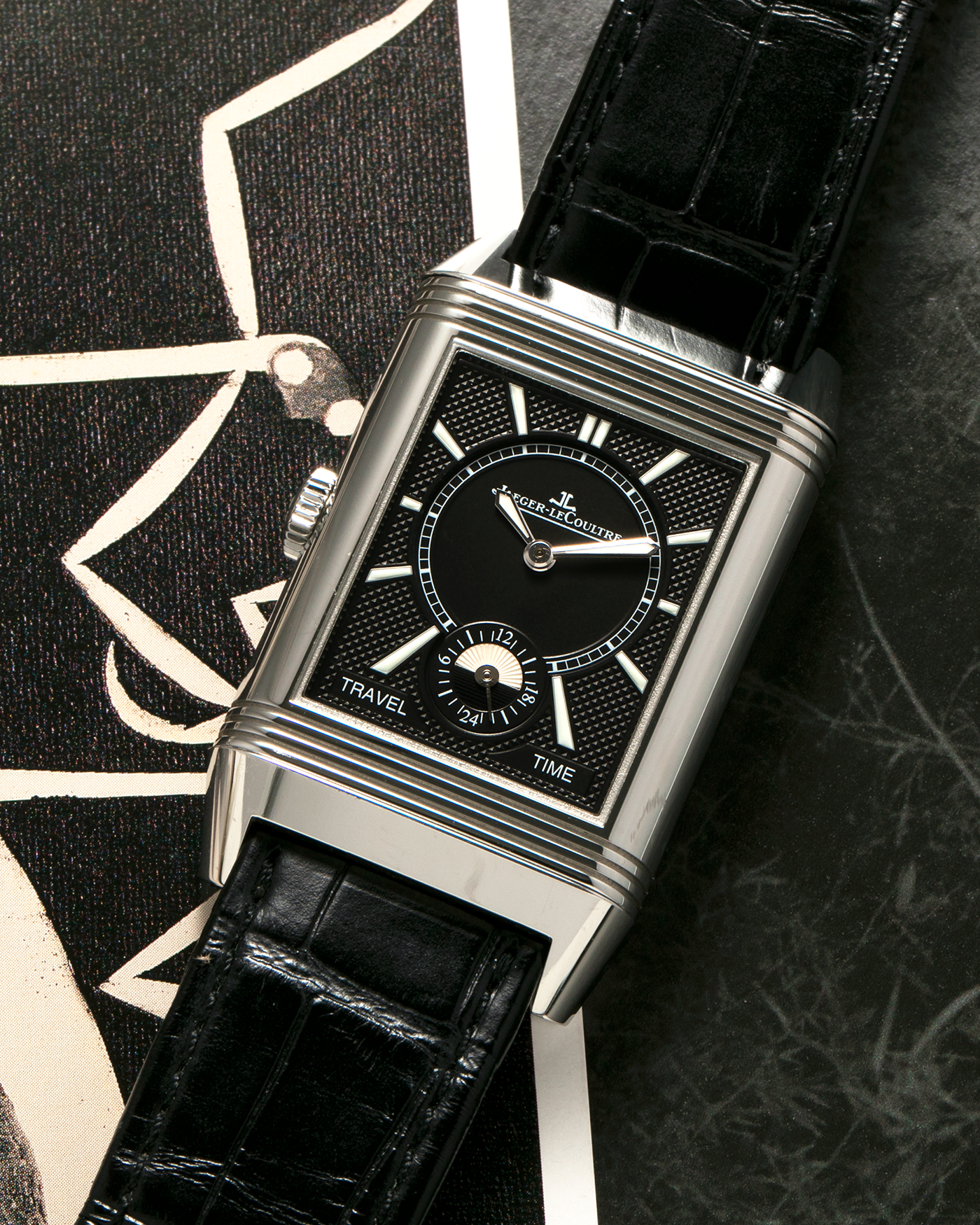 Brand: Jaeger LeCoultre Year: 2020 Model: Reverso Classic Large Duoface Q3848422 Reference Number: 215.8.D4 Material: Stainless Steel Movement: Jaeger LeCoultre Cal. 854A/2, Manual-Wind Case Dimensions: 47mm x 28.3mm x 10.3mm Lug Width: 20mm Strap: Jaeger LeCoultre Case Black Alligator Leather Strap with Signed Stainless Steel Deployant Buckle