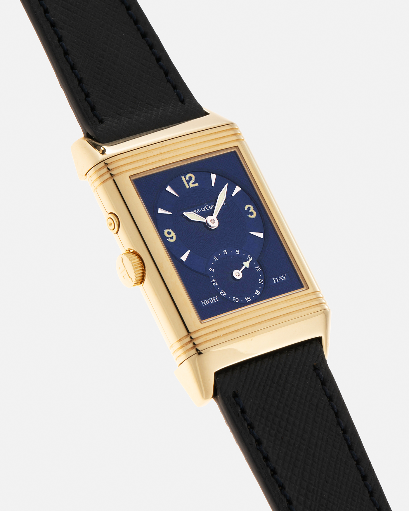Brand: Jaeger LeCoultre Year: 2000s Model: Reverso Duoface Japan Edition Blue, Limited Edition of 39 Pieces Reference Number: 270.1.54 Case Material: 18-carat Yellow Gold Movement: Jaeger LeCoultre Cal. 854, Manual-Wind Case Diameter: 42mm x 26mm Lug Width: 19mm Strap: Molequin Navy Blue Textured Calf Leather Strap with Signed 1-carat Yellow Gold Deployant Clasp, with additional Jaeger LeCoultre Black Alligator Leather Strap (Used)