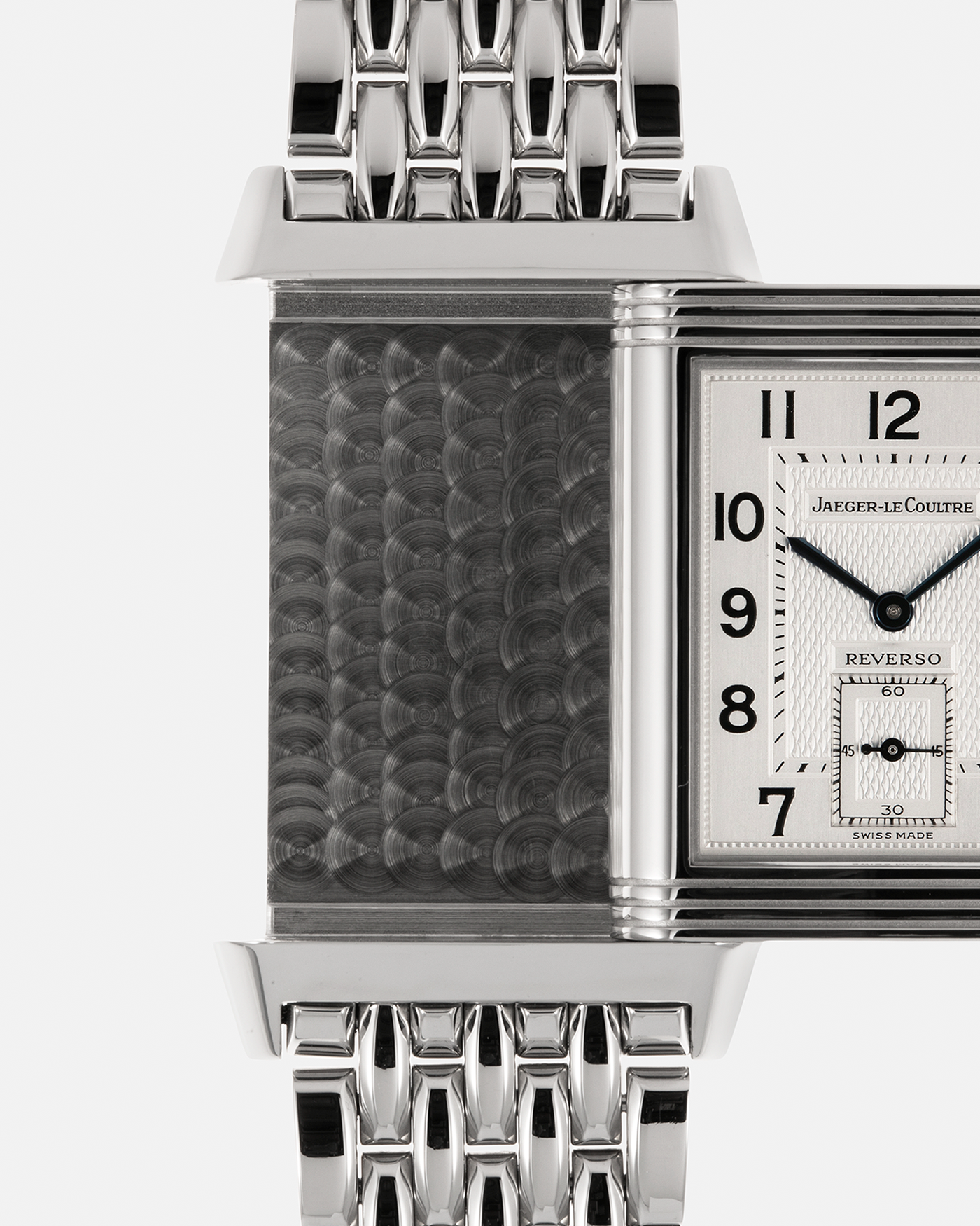 Brand: Jaeger LeCoultre
Year: 1999
Model: Reverso Duoface Japan Edition Green, Limited Edition of 300 Pieces
Reference Number: 270.8.54
Material: Stainless Steel
Movement: Jaeger LeCoultre Cal. 854, Manual-Winding
Case Dimensions: 42mm (Including Lugs) x 26mm x 9.5mm
Lug Width: 19mm
Bracelet: Jaeger LeCoultre Stainless Steel Bracelet With Signed Clasp