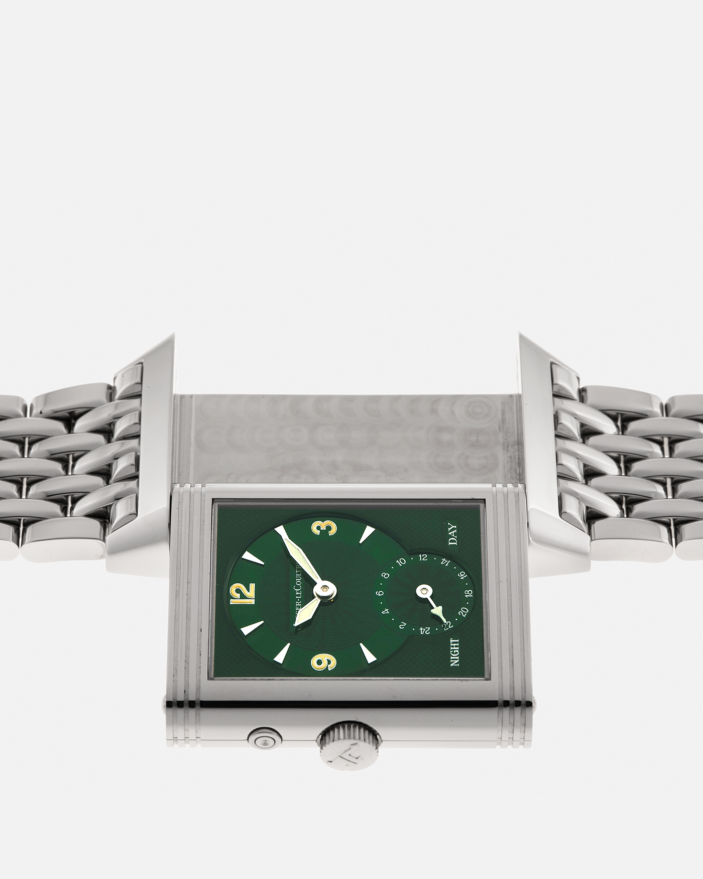 Brand: Jaeger LeCoultre
Year: 1999
Model: Reverso Duoface Japan Edition Green, Limited Edition of 300 Pieces
Reference Number: 270.8.54
Material: Stainless Steel
Movement: Jaeger LeCoultre Cal. 854, Manual-Winding
Case Dimensions: 42mm (Including Lugs) x 26mm x 9.5mm
Lug Width: 19mm
Bracelet: Jaeger LeCoultre Stainless Steel Bracelet With Signed Clasp
