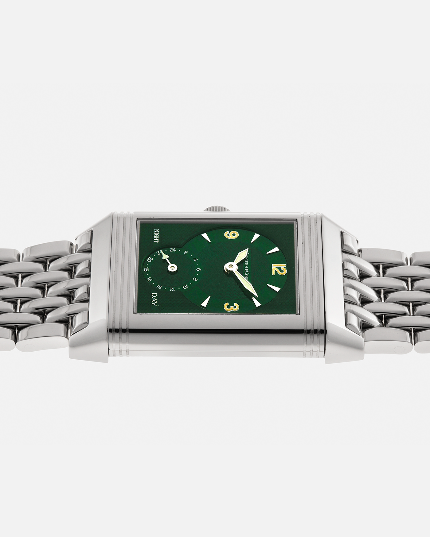 Brand: Jaeger LeCoultre
Year: 1999
Model: Reverso Duoface Japan Edition Green, Limited Edition of 300 Pieces
Reference Number: 270.8.54
Material: Stainless Steel
Movement: Jaeger LeCoultre Cal. 854, Manual-Winding
Case Dimensions: 42mm (Including Lugs) x 26mm x 9.5mm
Lug Width: 19mm
Bracelet: Jaeger LeCoultre Stainless Steel Bracelet With Signed Clasp
