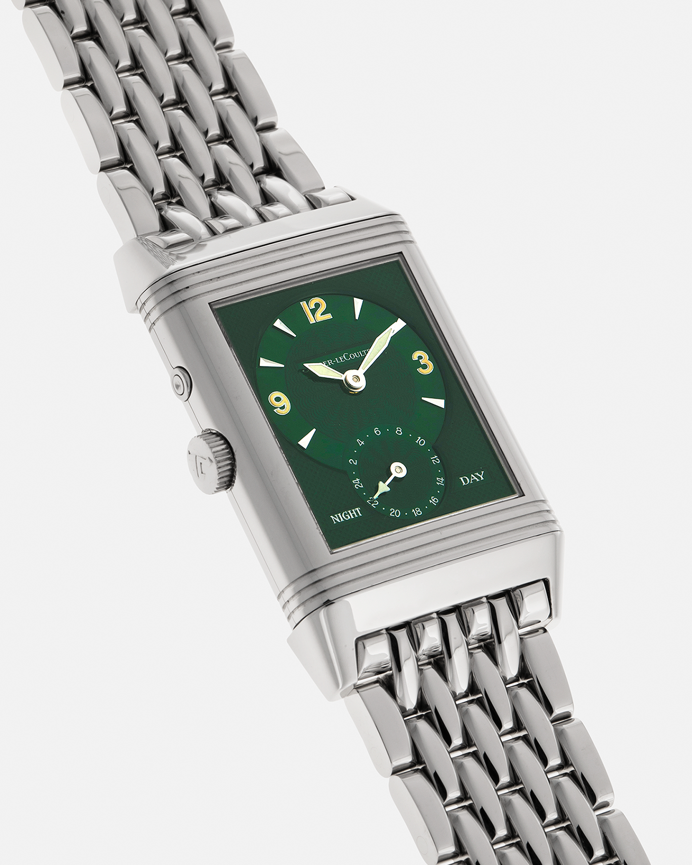 Brand: Jaeger LeCoultre
Year: 1999
Model: Reverso Duoface Japan Edition Green, Limited Edition of 300 Pieces
Reference Number: 270.8.54
Material: Stainless Steel
Movement: Jaeger LeCoultre Cal. 854, Manual-Winding
Case Dimensions: 42mm (Including Lugs) x 26mm x 9.5mm
Lug Width: 19mm
Bracelet: Jaeger LeCoultre Stainless Steel Bracelet With Signed Clasp
