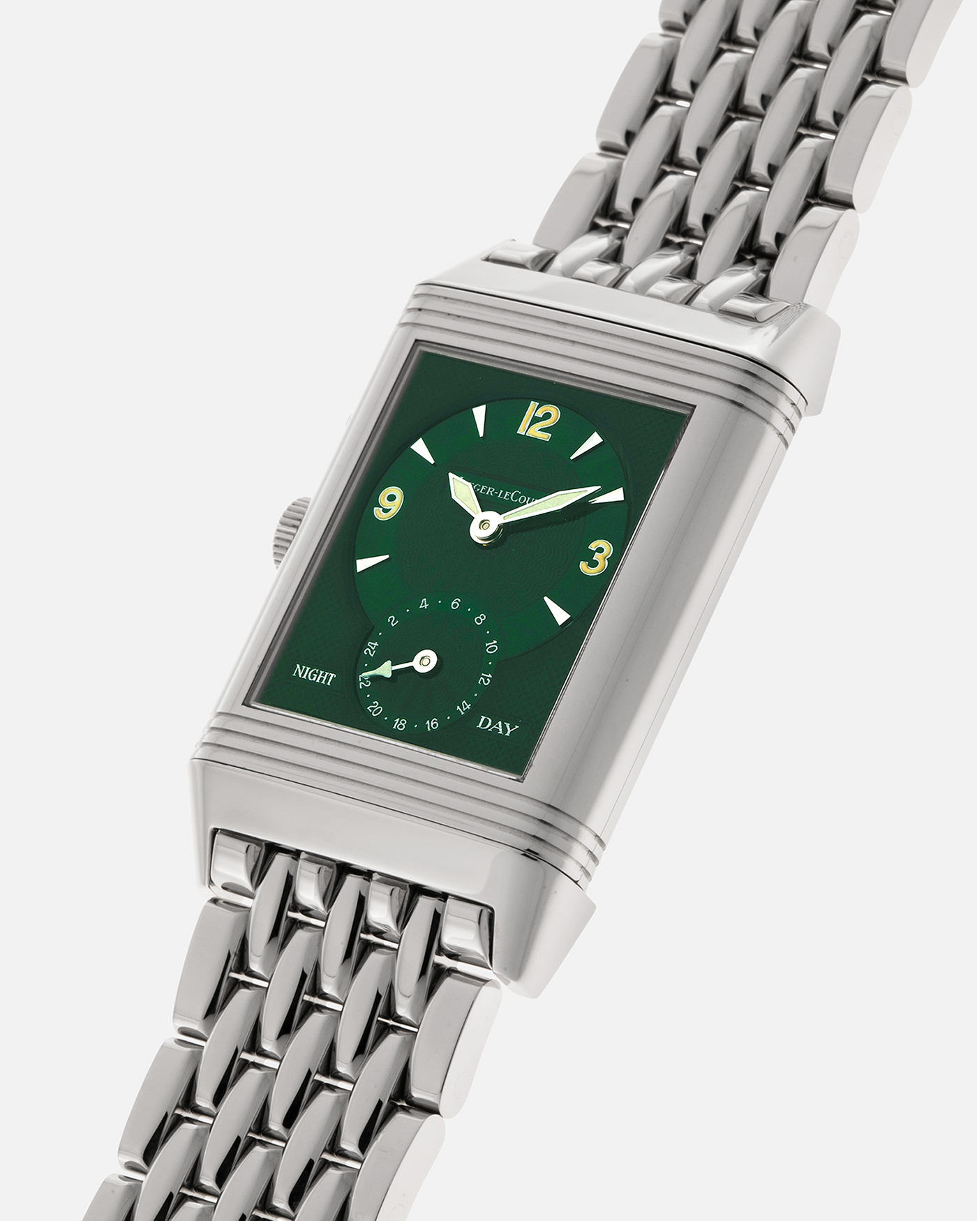 Brand: Jaeger LeCoultre
Year: 1999
Model: Reverso Duoface Japan Edition Green, Limited Edition of 300 Pieces
Reference Number: 270.8.54
Material: Stainless Steel
Movement: Jaeger LeCoultre Cal. 854, Manual-Winding
Case Dimensions: 42mm (Including Lugs) x 26mm x 9.5mm
Lug Width: 19mm
Bracelet: Jaeger LeCoultre Stainless Steel Bracelet With Signed Clasp