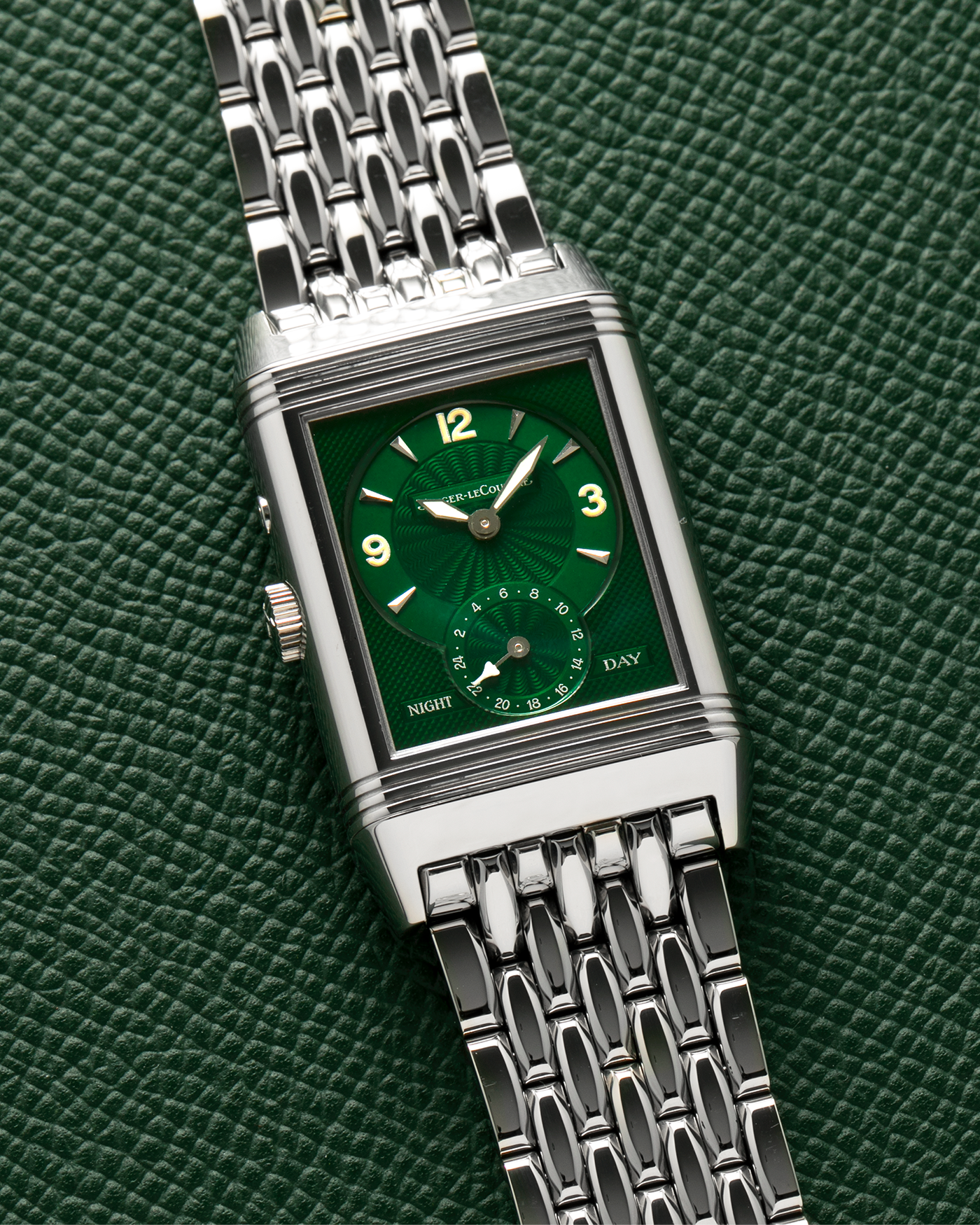 Brand: Jaeger LeCoultre
Year: 1999
Model: Reverso Duoface Japan Edition Green, Limited Edition of 300 Pieces
Reference Number: 270.8.54
Material: Stainless Steel
Movement: Jaeger LeCoultre Cal. 854, Manual-Winding
Case Dimensions: 42mm (Including Lugs) x 26mm x 9.5mm
Lug Width: 19mm
Bracelet: Jaeger LeCoultre Stainless Steel Bracelet With Signed Clasp