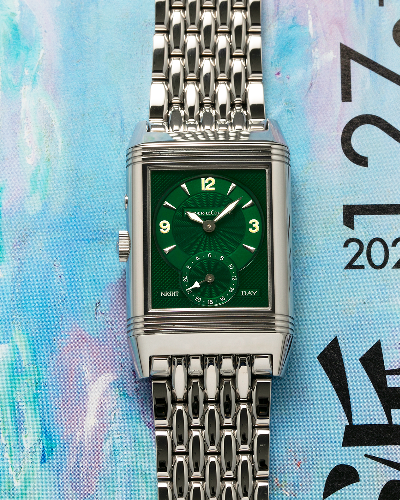 Brand: Jaeger LeCoultre
Year: 1999
Model: Reverso Duoface Japan Edition Green, Limited Edition of 300 Pieces
Reference Number: 270.8.54
Material: Stainless Steel
Movement: Jaeger LeCoultre Cal. 854, Manual-Winding
Case Dimensions: 42mm (Including Lugs) x 26mm x 9.5mm
Lug Width: 19mm
Bracelet: Jaeger LeCoultre Stainless Steel Bracelet With Signed Clasp