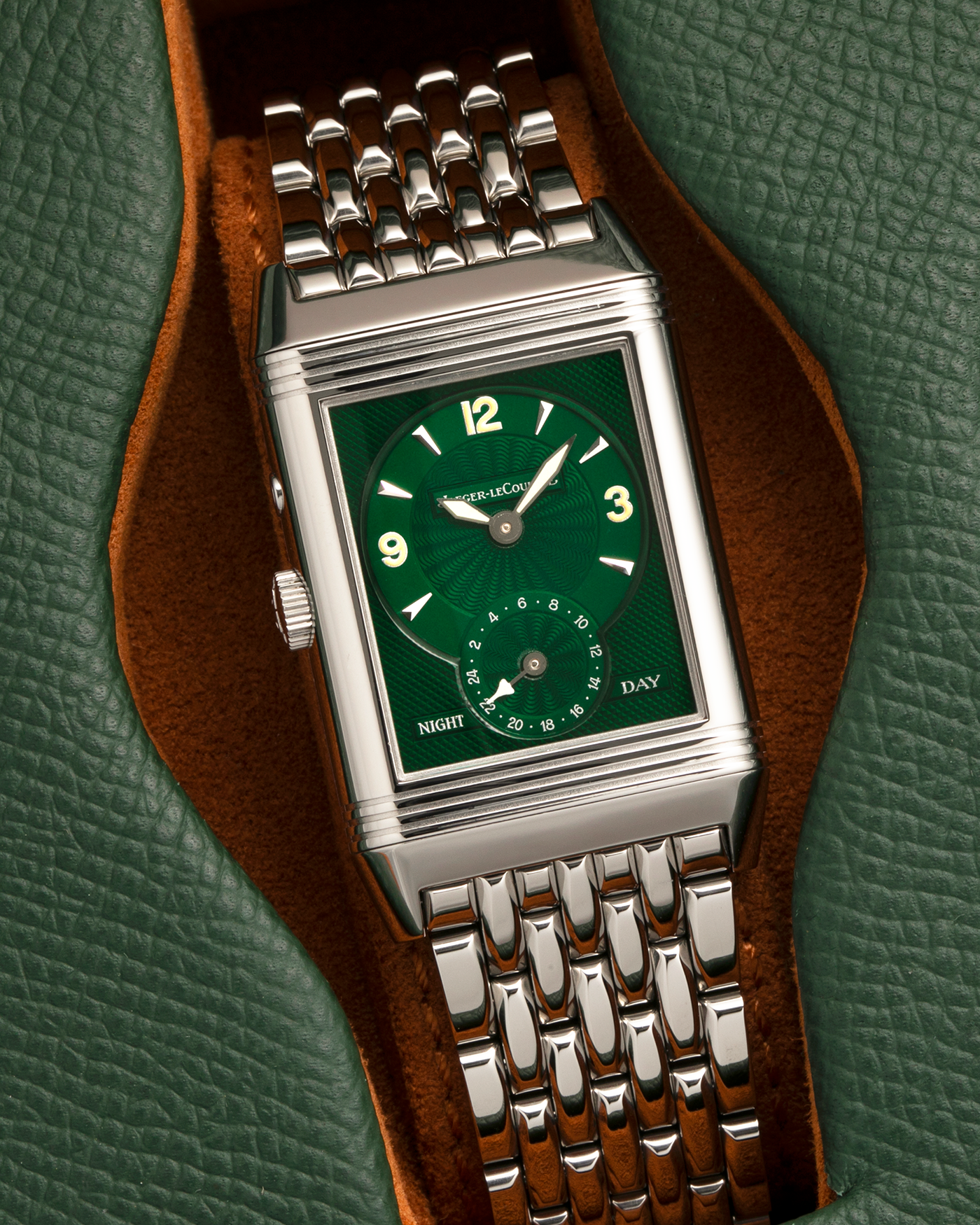Brand: Jaeger LeCoultre
Year: 1999
Model: Reverso Duoface Japan Edition Green, Limited Edition of 300 Pieces
Reference Number: 270.8.54
Material: Stainless Steel
Movement: Jaeger LeCoultre Cal. 854, Manual-Winding
Case Dimensions: 42mm (Including Lugs) x 26mm x 9.5mm
Lug Width: 19mm
Bracelet: Jaeger LeCoultre Stainless Steel Bracelet With Signed Clasp