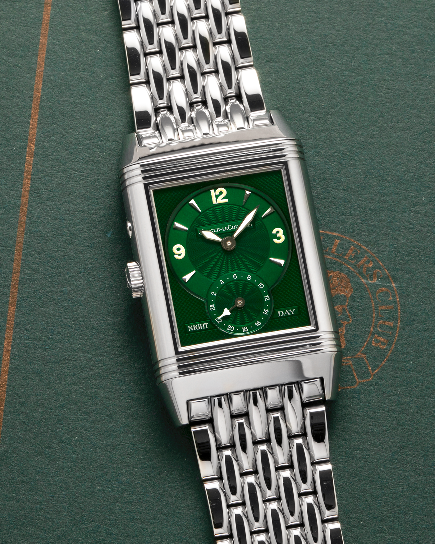 Brand: Jaeger LeCoultre
Year: 1999
Model: Reverso Duoface Japan Edition Green, Limited Edition of 300 Pieces
Reference Number: 270.8.54
Material: Stainless Steel
Movement: Jaeger LeCoultre Cal. 854, Manual-Winding
Case Dimensions: 42mm (Including Lugs) x 26mm x 9.5mm
Lug Width: 19mm
Bracelet: Jaeger LeCoultre Stainless Steel Bracelet With Signed Clasp