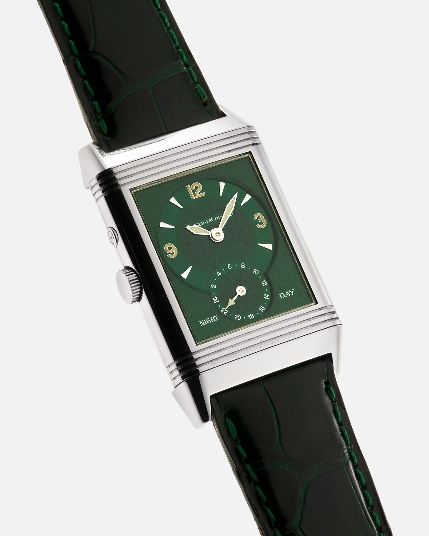 Brand: Jaeger-LeCoultre Year: 1999 Model: Reverso Duo Serie Premier, Ref. 270.8.54 Green Japan Edition Material: Stainless Steel Movement: Cal. 854, Manual-Wind Case Diameter: 42 x 26mm Bracelet/Strap: Emerald Green Crocodile Leather Strap with Signed Stainless Steel Deployant Clasp