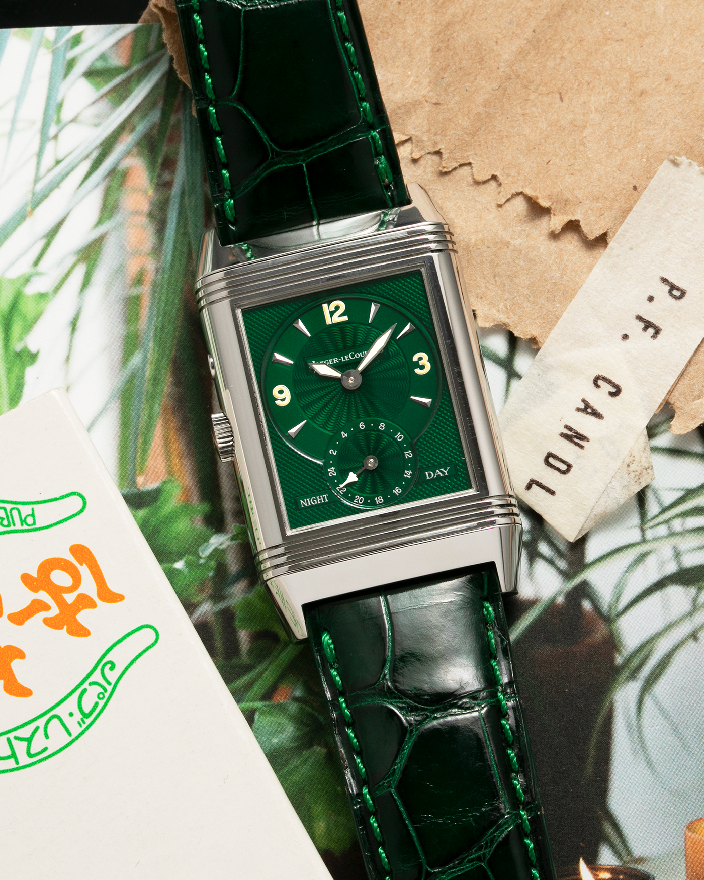 Brand: Jaeger-LeCoultre Year: 1999 Model: Reverso Duo Serie Premier, Ref. 270.8.54 Green Japan Edition Material: Stainless Steel Movement: Cal. 854, Manual-Wind Case Diameter: 42 x 26mm Bracelet/Strap: Emerald Green Crocodile Leather Strap with Signed Stainless Steel Deployant Clasp