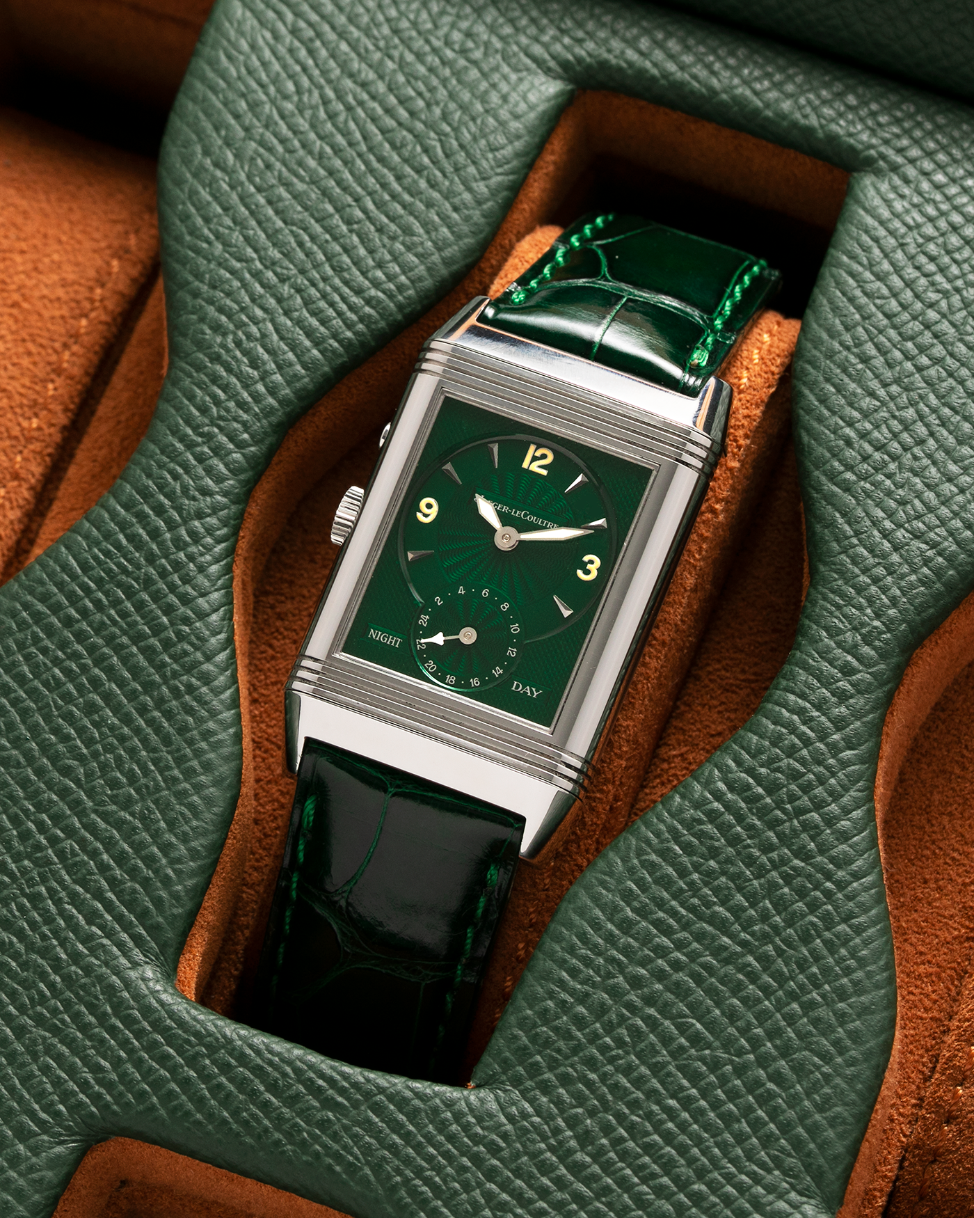 Brand: Jaeger-LeCoultre Year: 1999 Model: Reverso Duo Serie Premier, Ref. 270.8.54 Green Japan Edition Material: Stainless Steel Movement: Cal. 854, Manual-Wind Case Diameter: 42 x 26mm Bracelet/Strap: Emerald Green Crocodile Leather Strap with Signed Stainless Steel Deployant Clasp