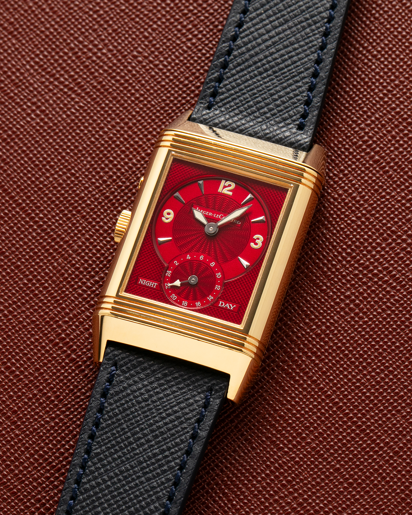 Brand: Jaeger-LeCoultre
Year: 1999
Model: Reverso Duoface Japan Edition Red, Limited Edition of 39 Pieces
Reference Number: 270.1.54
Material: 18-carat Yellow Gold
Movement: Jaeger-LeCoultre Cal. 854, Manual-Wind
Case Dimensions: 42mm (Including Lugs) x 26mm
Lug Width: 19mm
Strap: Molequin Navy Blue Textured Calf Strap with Signed 18-carat Yellow Gold Tang Buckle