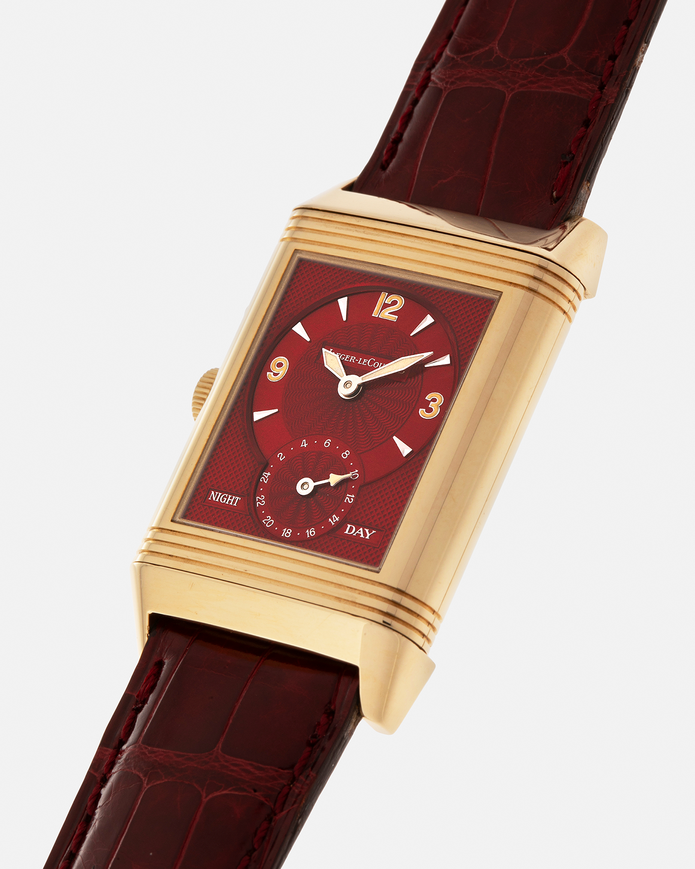 Brand: Jaeger LeCoultre
Year: 1999
Model: Reverso Duoface Japan Edition Red, Limited Edition of 39 Pieces
Reference Number: 270.1.54
Material: 18-carat Yellow Gold
Movement: Jaeger LeCoultre Cal. 854, Manual-Wind
Case Dimensions: 42mm (Including Lugs) x 26mm
Lug Width: 19mm
Strap: Jaeger LeCoultre Burgundy Red Alligator Leather Strap with Signed 18-carat Yellow Gold Tang Buckle