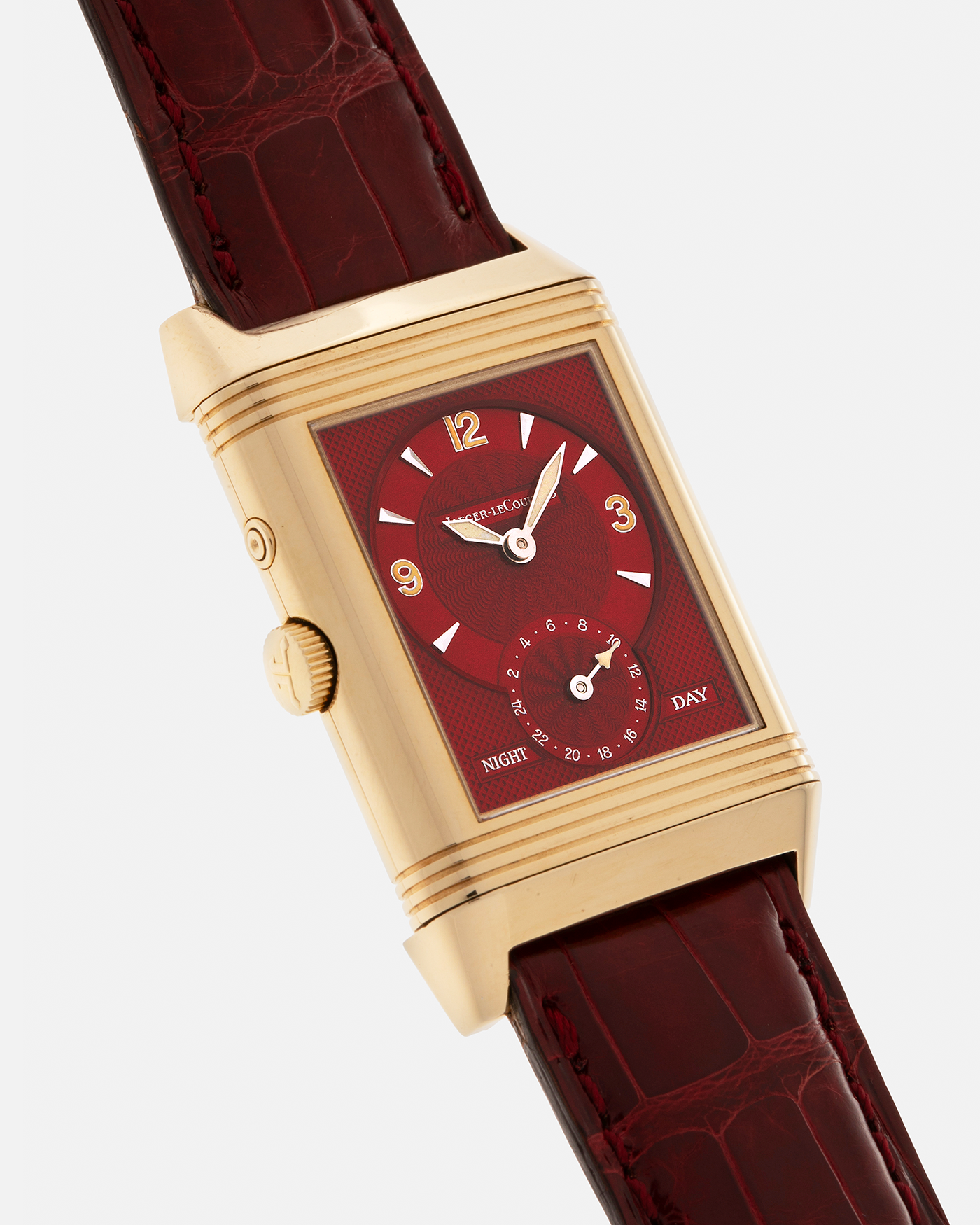 Brand: Jaeger LeCoultre
Year: 1999
Model: Reverso Duoface Japan Edition Red, Limited Edition of 39 Pieces
Reference Number: 270.1.54
Material: 18-carat Yellow Gold
Movement: Jaeger LeCoultre Cal. 854, Manual-Wind
Case Dimensions: 42mm (Including Lugs) x 26mm
Lug Width: 19mm
Strap: Jaeger LeCoultre Burgundy Red Alligator Leather Strap with Signed 18-carat Yellow Gold Tang Buckle