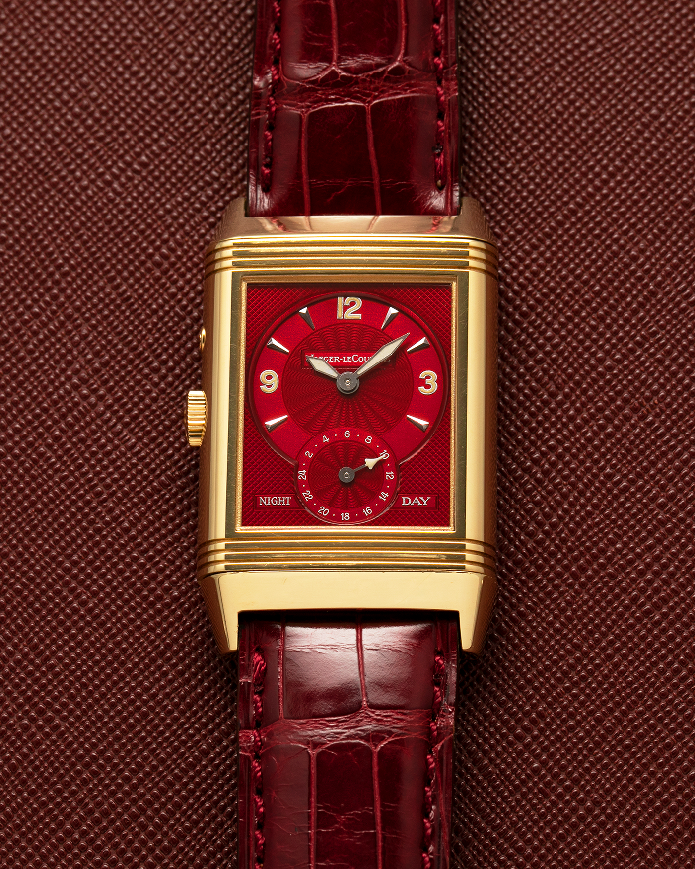 Brand: Jaeger LeCoultre
Year: 1999
Model: Reverso Duoface Japan Edition Red, Limited Edition of 39 Pieces
Reference Number: 270.1.54
Material: 18-carat Yellow Gold
Movement: Jaeger LeCoultre Cal. 854, Manual-Wind
Case Dimensions: 42mm (Including Lugs) x 26mm
Lug Width: 19mm
Strap: Jaeger LeCoultre Burgundy Red Alligator Leather Strap with Signed 18-carat Yellow Gold Tang Buckle