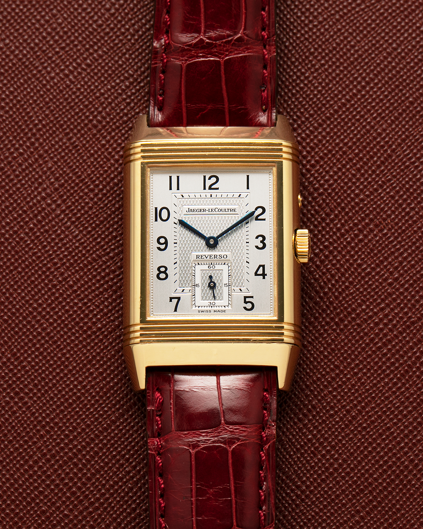 Brand: Jaeger LeCoultre
Year: 1999
Model: Reverso Duoface Japan Edition Red, Limited Edition of 39 Pieces
Reference Number: 270.1.54
Material: 18-carat Yellow Gold
Movement: Jaeger LeCoultre Cal. 854, Manual-Wind
Case Dimensions: 42mm (Including Lugs) x 26mm
Lug Width: 19mm
Strap: Jaeger LeCoultre Burgundy Red Alligator Leather Strap with Signed 18-carat Yellow Gold Tang Buckle