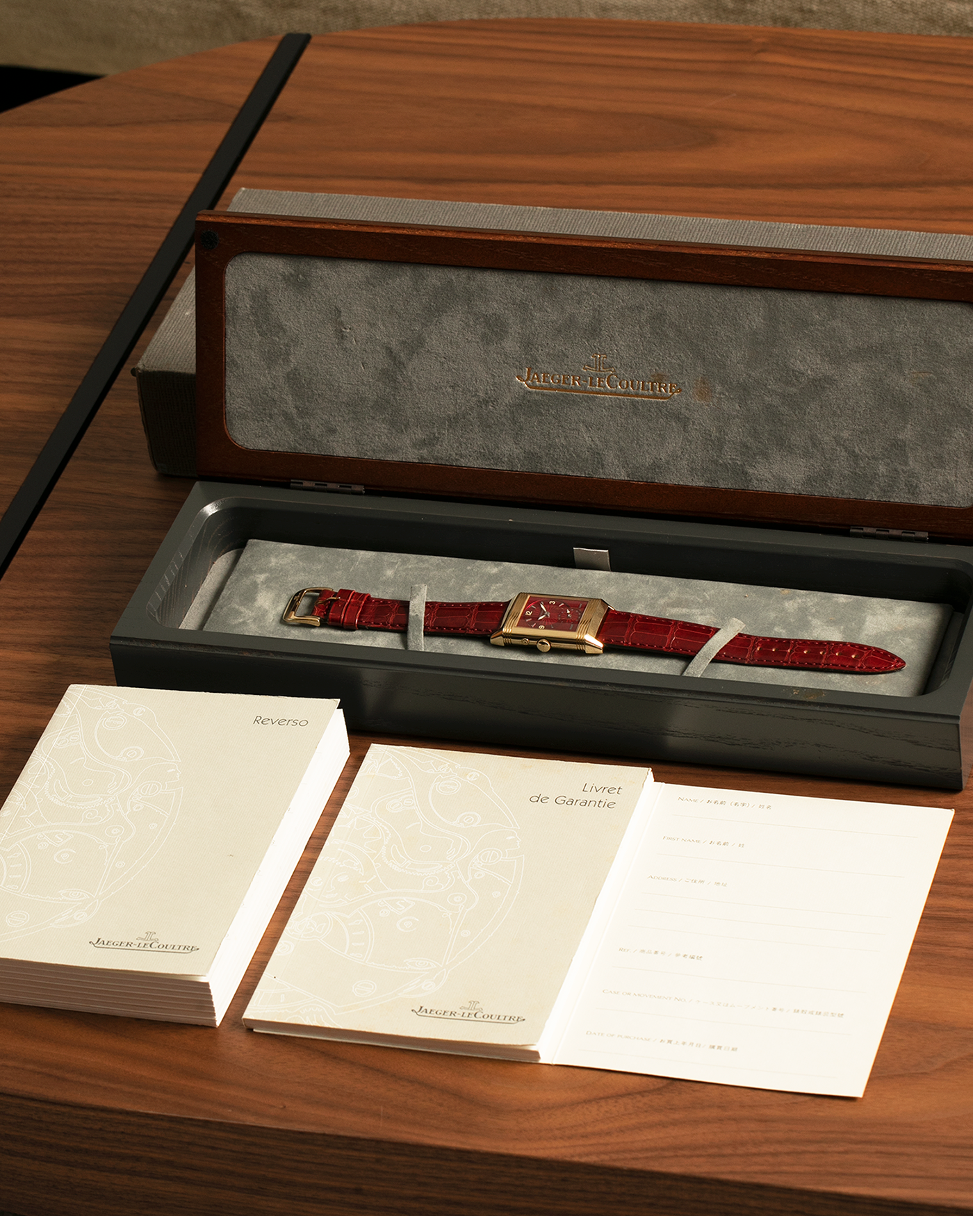 Brand: Jaeger LeCoultre
Year: 1999
Model: Reverso Duoface Japan Edition Red, Limited Edition of 39 Pieces
Reference Number: 270.1.54
Material: 18-carat Yellow Gold
Movement: Jaeger LeCoultre Cal. 854, Manual-Wind
Case Dimensions: 42mm (Including Lugs) x 26mm
Lug Width: 19mm
Strap: Jaeger LeCoultre Burgundy Red Alligator Leather Strap with Signed 18-carat Yellow Gold Tang Buckle