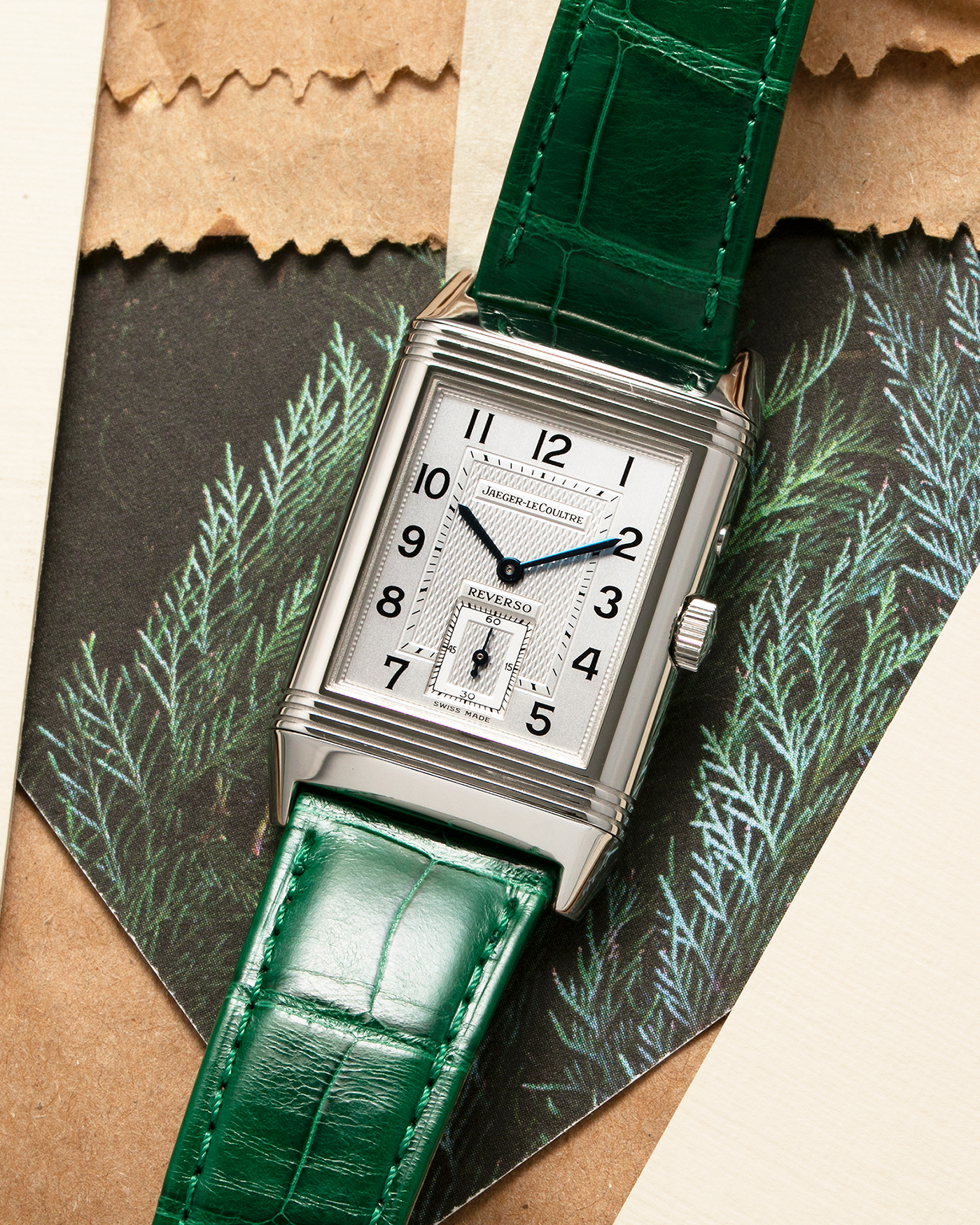 Brand: Jaeger LeCoultre Year: 1999 Model: Reverso Duoface Japan Edition Green, Limited Edition of 300 Pieces Reference Number: 270.8.54 Material: Stainless Steel Movement: Jaeger LeCoultre Cal. 854, Manual-Wind Case Diameter: 42mm x 26mm Lug Width: 19mm Strap: Jaeger LeCoultre Green Alligator Leather with Signed Stainless Steel Deployant Clasp
