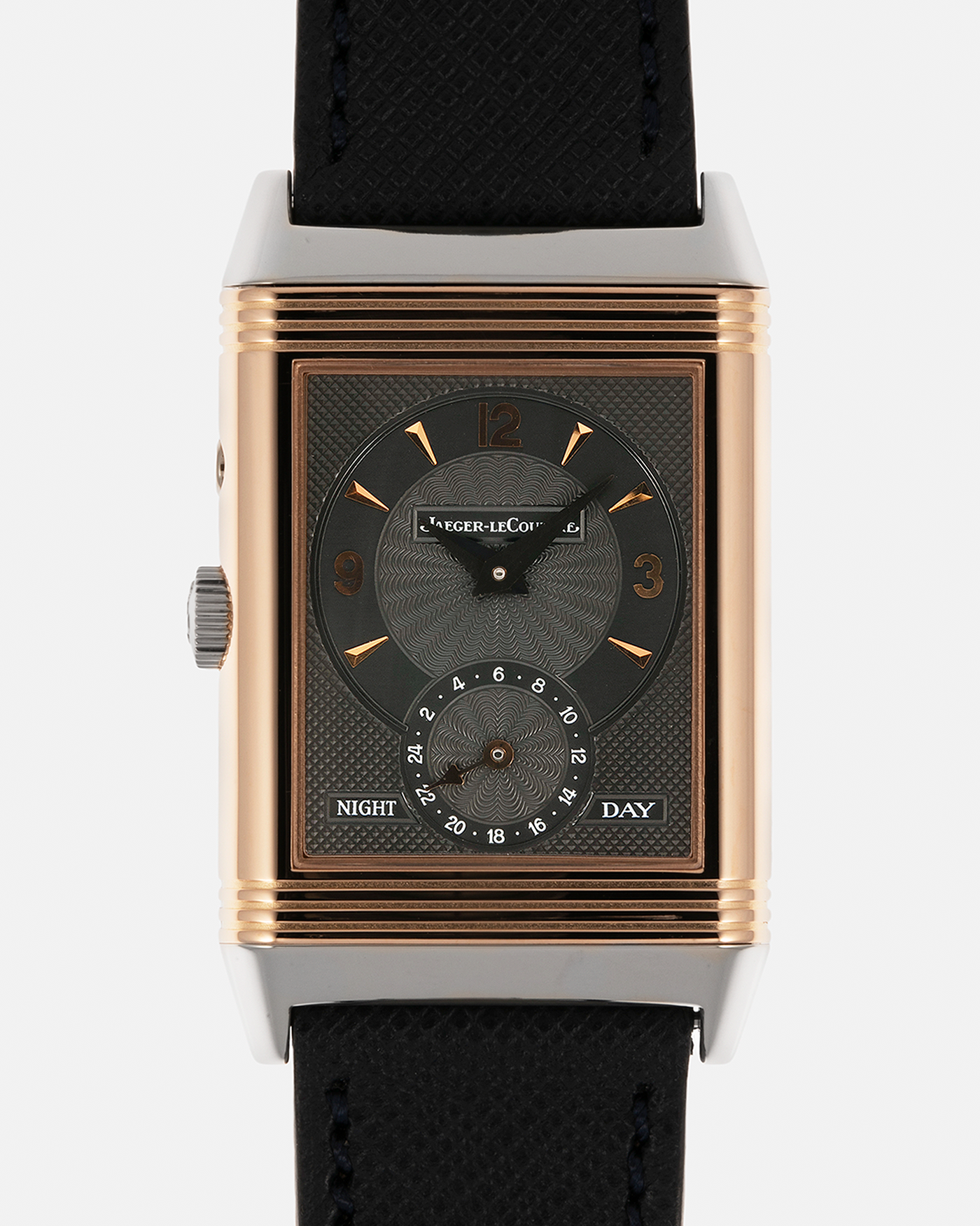 Brand: Jaeger LeCoultre
Year: 1990s
Model: Reverso Duoface Japan Edition, Limited Edition of 250 pieces
Reference: 270.0.54A
Material: 18-carat White Gold, 18-carat Rose Gold
Movement: Jaeger LeCoultre Cal. 854, Manual-Wind
Case Dimensions: 42mm (Including Lugs) x 26mm
Lug Width: 19mm
Strap: Molequin Dark Navy Textured Calf Leather Strap with Signed 18-carat White Gold Deployant Clasp