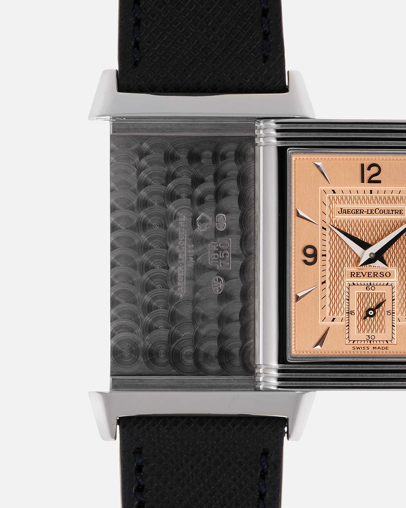 Brand: Jaeger LeCoultre
Year: 1990s
Model: Reverso Duoface Japan Edition, Limited Edition of 250 pieces
Reference: 270.0.54A
Material: 18-carat White Gold, 18-carat Rose Gold
Movement: Jaeger LeCoultre Cal. 854, Manual-Wind
Case Dimensions: 42mm (Including Lugs) x 26mm
Lug Width: 19mm
Strap: Molequin Dark Navy Textured Calf Leather Strap with Signed 18-carat White Gold Deployant Clasp