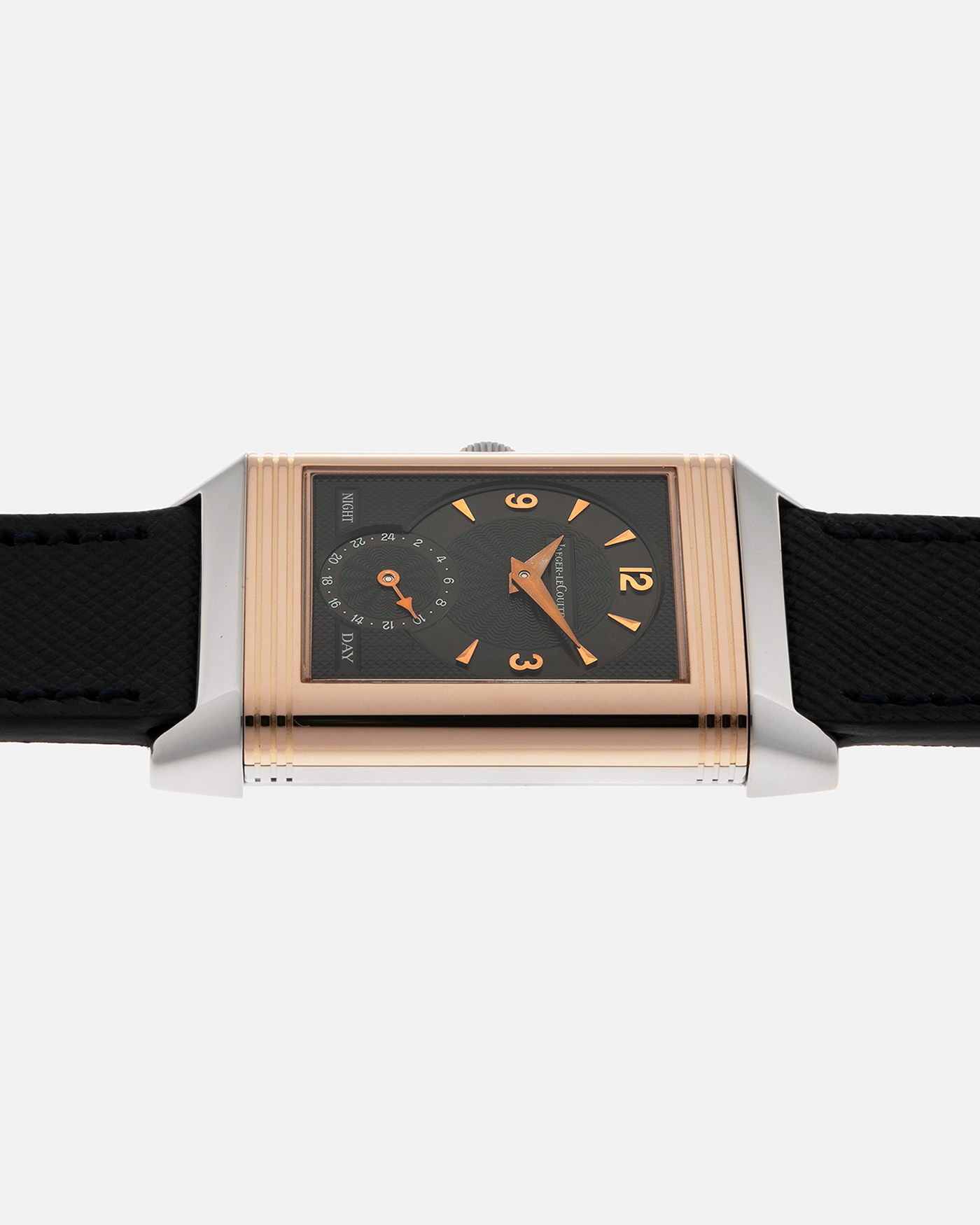 Brand: Jaeger LeCoultre
Year: 1990s
Model: Reverso Duoface Japan Edition, Limited Edition of 250 pieces
Reference: 270.0.54A
Material: 18-carat White Gold, 18-carat Rose Gold
Movement: Jaeger LeCoultre Cal. 854, Manual-Wind
Case Dimensions: 42mm (Including Lugs) x 26mm
Lug Width: 19mm
Strap: Molequin Dark Navy Textured Calf Leather Strap with Signed 18-carat White Gold Deployant Clasp