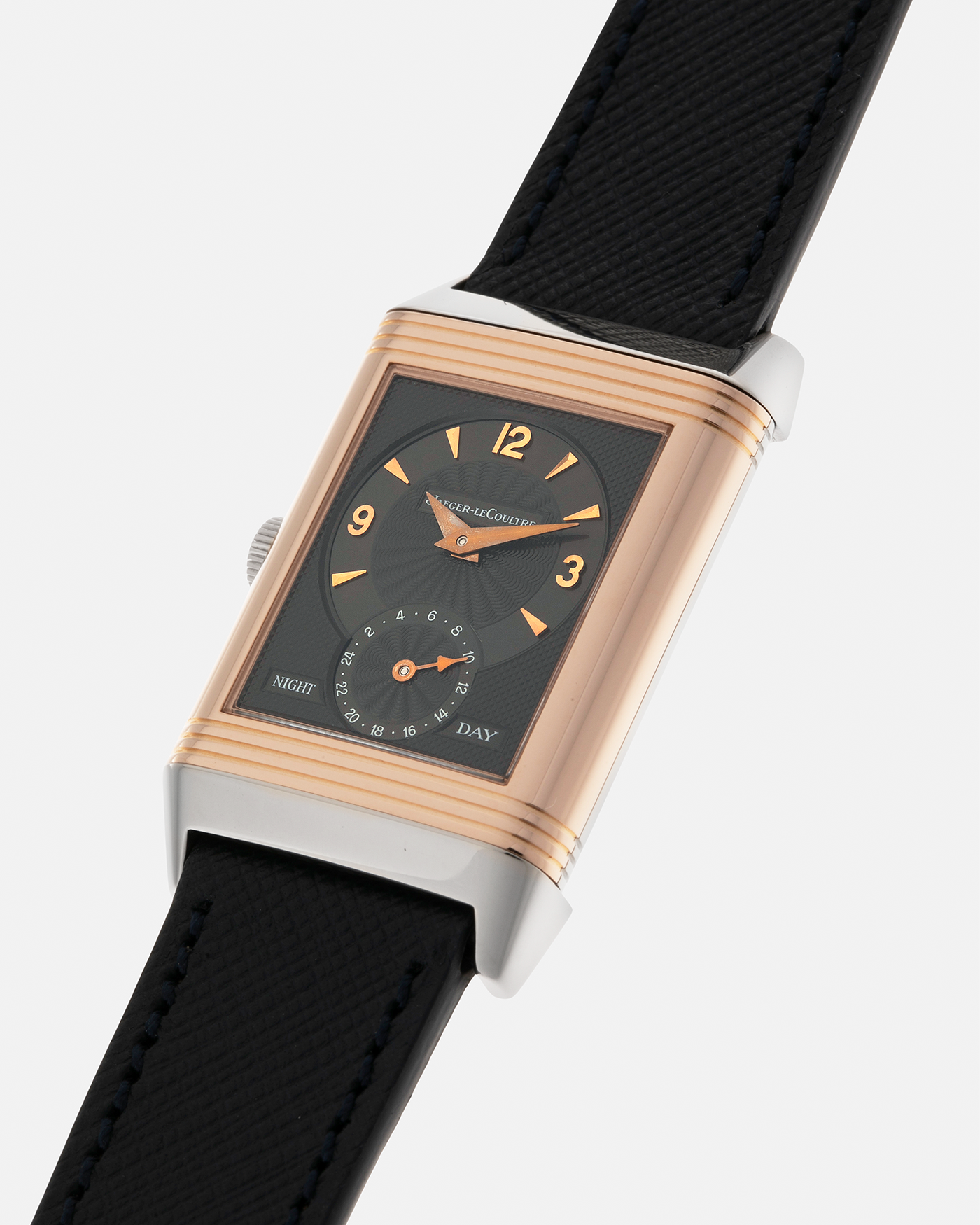 Brand: Jaeger LeCoultre
Year: 1990s
Model: Reverso Duoface Japan Edition, Limited Edition of 250 pieces
Reference: 270.0.54A
Material: 18-carat White Gold, 18-carat Rose Gold
Movement: Jaeger LeCoultre Cal. 854, Manual-Wind
Case Dimensions: 42mm (Including Lugs) x 26mm
Lug Width: 19mm
Strap: Molequin Dark Navy Textured Calf Leather Strap with Signed 18-carat White Gold Deployant Clasp