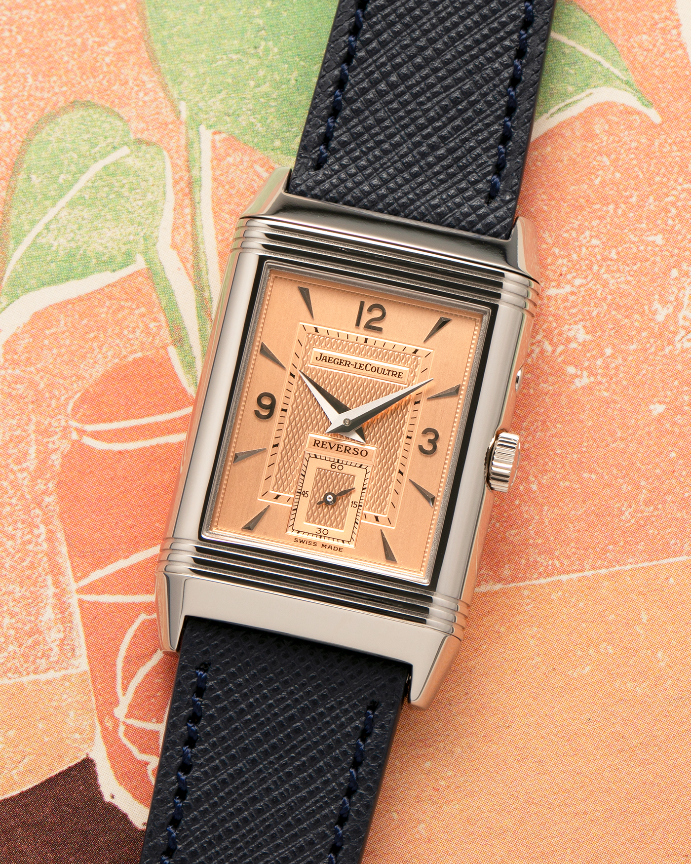 Brand: Jaeger LeCoultre
Year: 1990s
Model: Reverso Duoface Japan Edition, Limited Edition of 250 pieces
Reference: 270.0.54A
Material: 18-carat White Gold, 18-carat Rose Gold
Movement: Jaeger LeCoultre Cal. 854, Manual-Wind
Case Dimensions: 42mm (Including Lugs) x 26mm
Lug Width: 19mm
Strap: Molequin Dark Navy Textured Calf Leather Strap with Signed 18-carat White Gold Deployant Clasp