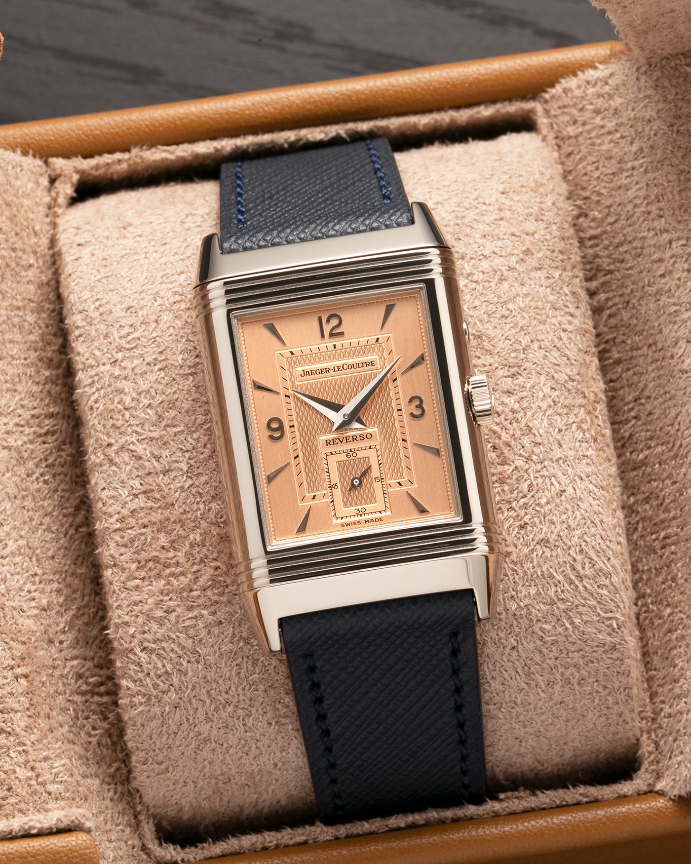 Brand: Jaeger LeCoultre
Year: 1990s
Model: Reverso Duoface Japan Edition, Limited Edition of 250 pieces
Reference: 270.0.54A
Material: 18-carat White Gold, 18-carat Rose Gold
Movement: Jaeger LeCoultre Cal. 854, Manual-Wind
Case Dimensions: 42mm (Including Lugs) x 26mm
Lug Width: 19mm
Strap: Molequin Dark Navy Textured Calf Leather Strap with Signed 18-carat White Gold Deployant Clasp