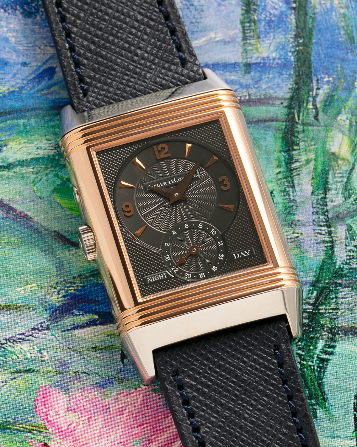 Brand: Jaeger LeCoultre
Year: 1990s
Model: Reverso Duoface Japan Edition, Limited Edition of 250 pieces
Reference: 270.0.54A
Material: 18-carat White Gold, 18-carat Rose Gold
Movement: Jaeger LeCoultre Cal. 854, Manual-Wind
Case Dimensions: 42mm (Including Lugs) x 26mm
Lug Width: 19mm
Strap: Molequin Dark Navy Textured Calf Leather Strap with Signed 18-carat White Gold Deployant Clasp