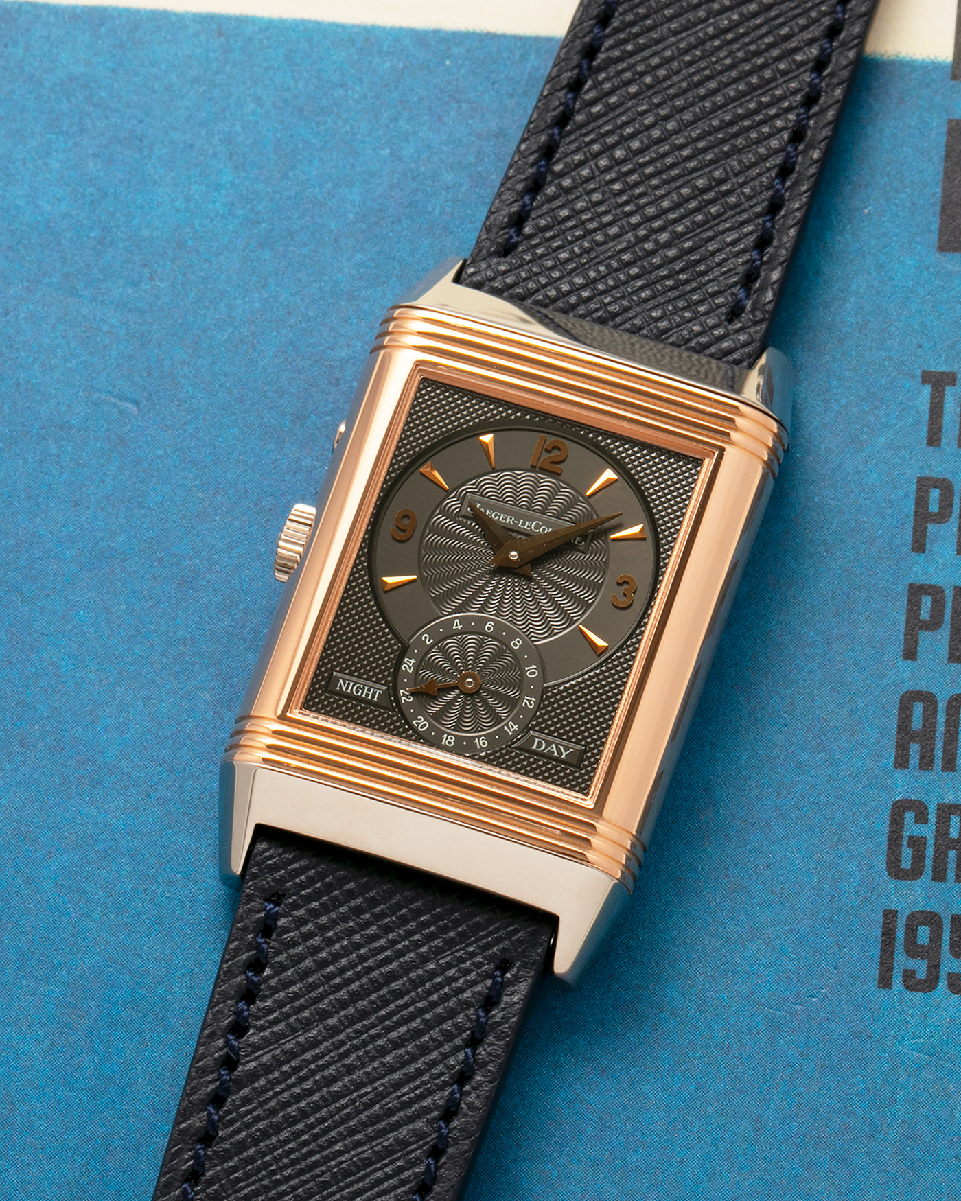 Brand: Jaeger LeCoultre
Year: 1990s
Model: Reverso Duoface Japan Edition, Limited Edition of 250 pieces
Reference: 270.0.54A
Material: 18-carat White Gold, 18-carat Rose Gold
Movement: Jaeger LeCoultre Cal. 854, Manual-Wind
Case Dimensions: 42mm (Including Lugs) x 26mm
Lug Width: 19mm
Strap: Molequin Dark Navy Textured Calf Leather Strap with Signed 18-carat White Gold Deployant Clasp
