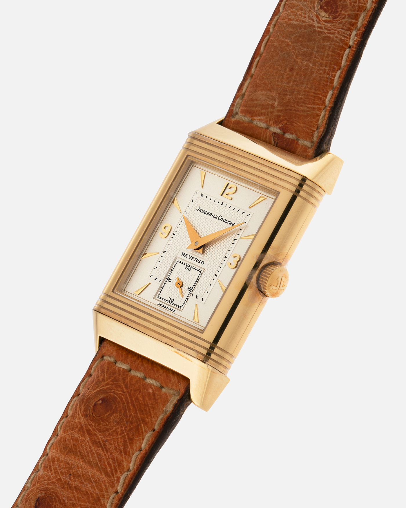 Brand: Jaeger LeCoultre
Year: 1995
Model: Reverso Geneva Fountain / Cathedral Saint-Pierre
Reference: 275.1.62 / 275.142.626 YG
Material: 18k Yellow Gold
Movement: Jaeger LeCoultre Cal. 852, Manual-Winding
Case Dimensions: 42mm X 26mm (10mm Thickness)
Lug Width: 19mm
Strap: Brown Jaeger-LeCoutre Ostrich Leather Strap with Jaeger-LeCoultre 18k Yellow Gold Tang Buckle
