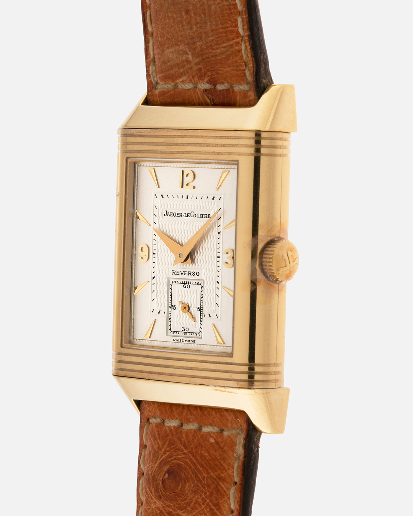 Brand: Jaeger LeCoultre
Year: 1995
Model: Reverso Geneva Fountain / Cathedral Saint-Pierre
Reference: 275.1.62 / 275.142.626 YG
Material: 18k Yellow Gold
Movement: Jaeger LeCoultre Cal. 852, Manual-Winding
Case Dimensions: 42mm X 26mm (10mm Thickness)
Lug Width: 19mm
Strap: Brown Jaeger-LeCoutre Ostrich Leather Strap with Jaeger-LeCoultre 18k Yellow Gold Tang Buckle
