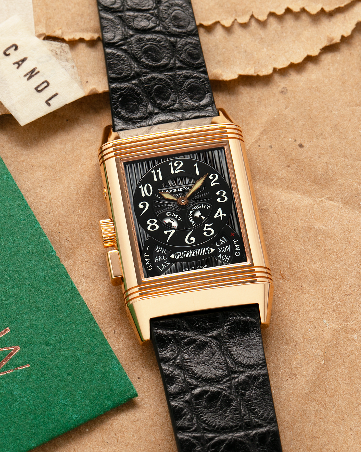 Brand: Jaeger LeCoultre
Year: 1998
Model: Reverso Géographique World Time Duoface, Limited to 500 pieces
Reference: 270.2.58
Material: 18k Rose Gold
Movement: Jaeger LeCoultre Cal. 858, Manual-Winding
Case Dimensions: 42mm (Including Lugs) x 26mm x 10mm
Lug Width: 19mm
Strap: Black Handdn Round-Scale Alligator Leather Strap with Jaeger-LeCoultre 18k Rose Gold Deployant Clasp