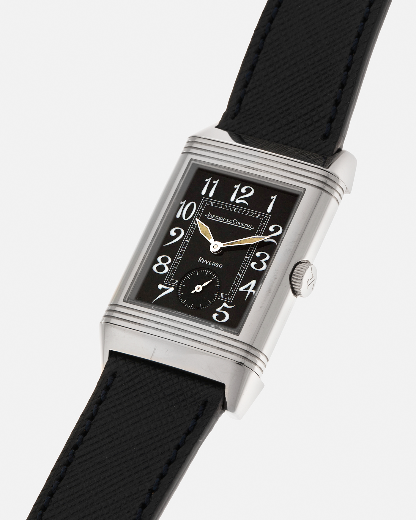 Brand: Jaeger LeCoultre
Year: 2000s
Model: Reverso Grande Taille ‘Art Deco‘
Reference: 270.2.62
Material: 18-carat White Gold
Movement: Jaeger LeCoultre Cal. 822, Manual-Winding
Case Diameter: 42mm (Including Lugs) x 26mm x 9.5mm
Lug Width: 19mm
Strap: Nostime Navy Blue Grained Calf Leather Strap