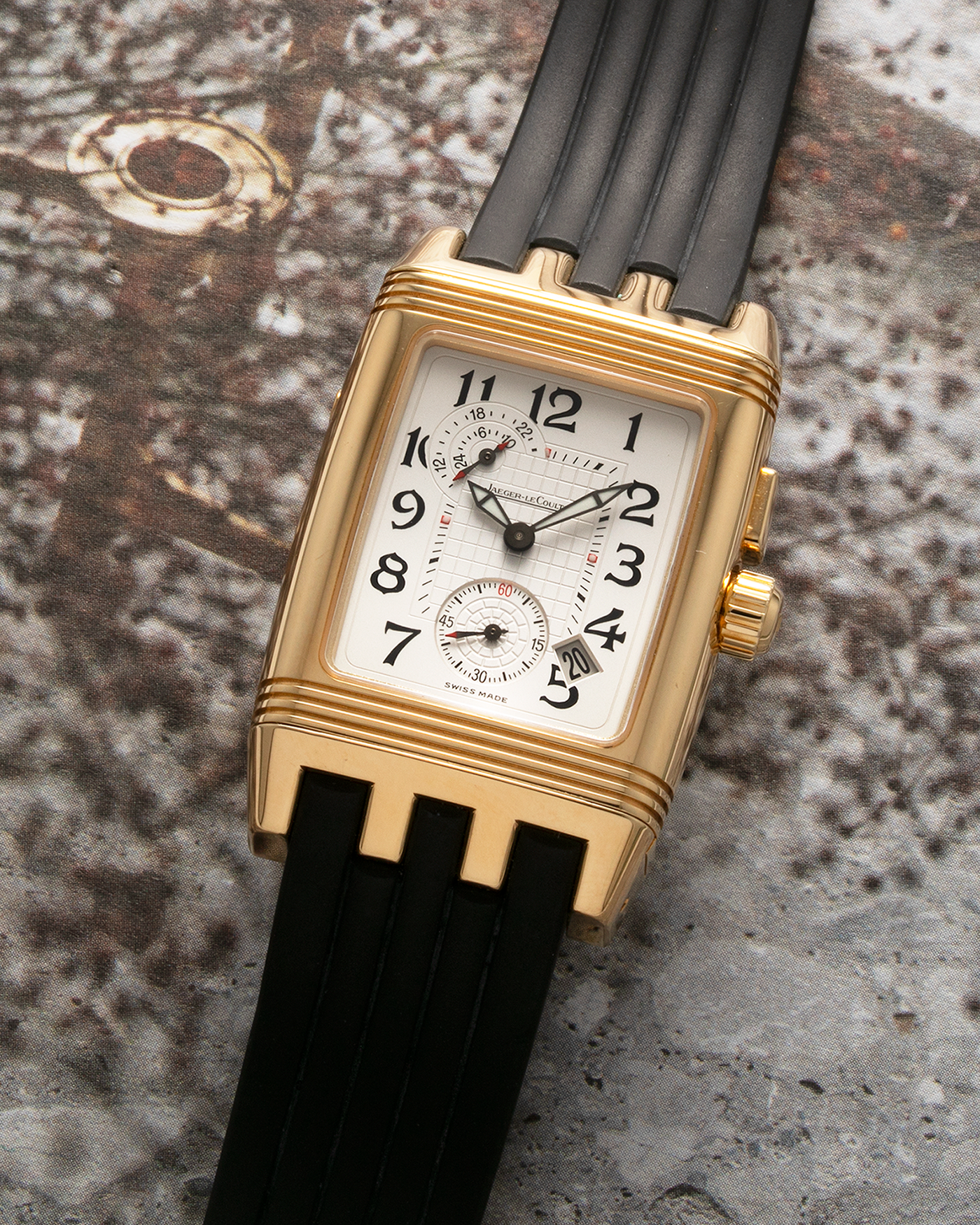 Brand: Jaeger LeCoultre Year: 2000’s Model: Reverso Night and Day Gran’ Sport Duo Model Number: Q2941601 Reference Number: 295.1.51 Material: 18-carat Yellow Gold Movement: JLC Cal. 851, Manual-Wind Case Diameter: 44mm x 38mm Strap: Jaeger LeCoultre Gran’ Sport Rubber Strap with Signed 18-carat Yellow Gold Deployant Clasp