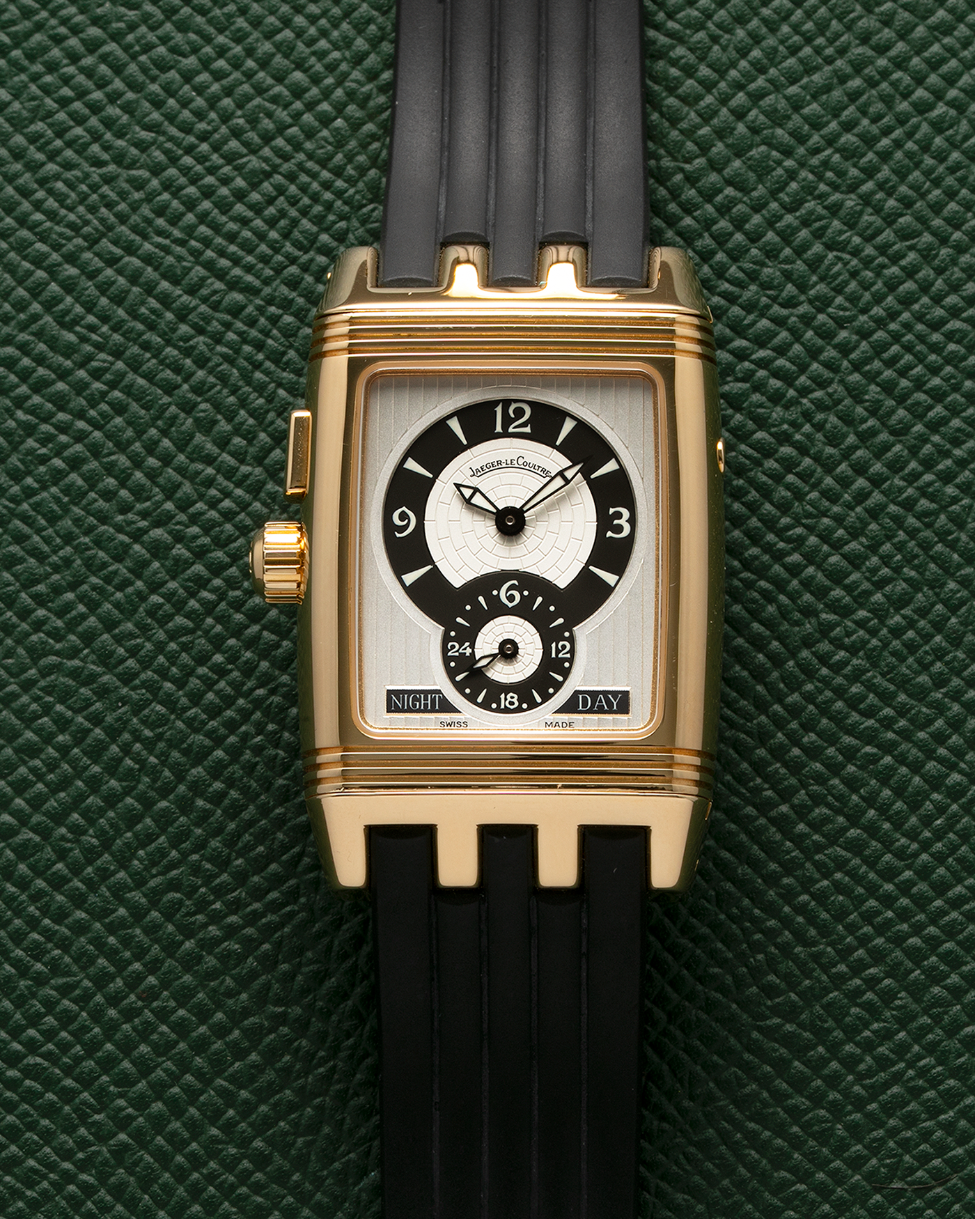 Brand: Jaeger LeCoultre Year: 2000’s Model: Reverso Night and Day Gran’ Sport Duo Model Number: Q2941601 Reference Number: 295.1.51 Material: 18-carat Yellow Gold Movement: JLC Cal. 851, Manual-Wind Case Diameter: 44mm x 38mm Strap: Jaeger LeCoultre Gran’ Sport Rubber Strap with Signed 18-carat Yellow Gold Deployant Clasp