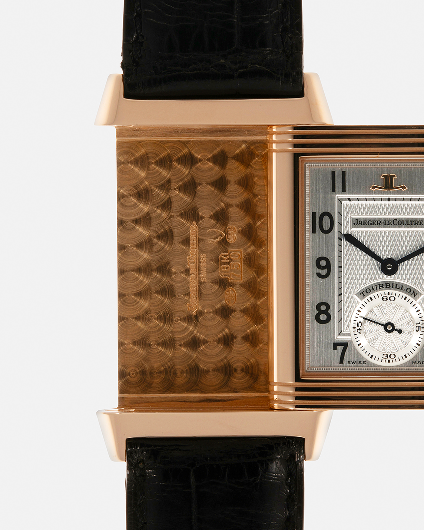 Brand: Jaeger LeCoultre
Year: 1990s
Model: Reverso Tourbillon, Limited to 500 pieces
Reference: 270.2.68
Material: 18-carat Rose Gold
Movement: Jaeger LeCoultre Cal. 828, Manual-Winding
Case Dimensions: 42mm (Including Lugs) x 26mm x 10mm
Lug Width: 19mm
Strap: Jaeger LeCoultre Black Alligator Leather Strap with Signed 18-carat Rose Gold Deployant Clasp