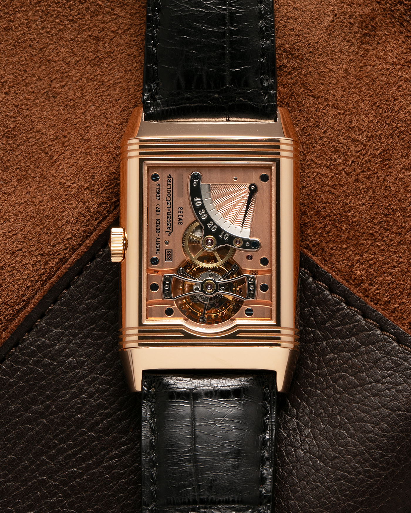 Brand: Jaeger LeCoultre
Year: 1990s
Model: Reverso Tourbillon, Limited to 500 pieces
Reference: 270.2.68
Material: 18-carat Rose Gold
Movement: Jaeger LeCoultre Cal. 828, Manual-Winding
Case Dimensions: 42mm (Including Lugs) x 26mm x 10mm
Lug Width: 19mm
Strap: Jaeger LeCoultre Black Alligator Leather Strap with Signed 18-carat Rose Gold Deployant Clasp